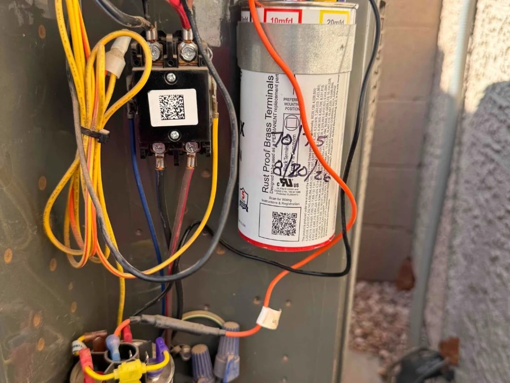 Technician completing residential heating maintenance