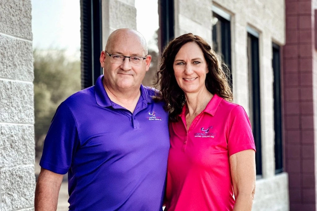 John and Robin, the family and veteran owners of AZ Perfect Comfort, outside their Phoenix-area office