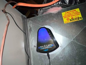 REME HALO LED whole-home air purifier installed in a duct by AZ Perfect Comfort