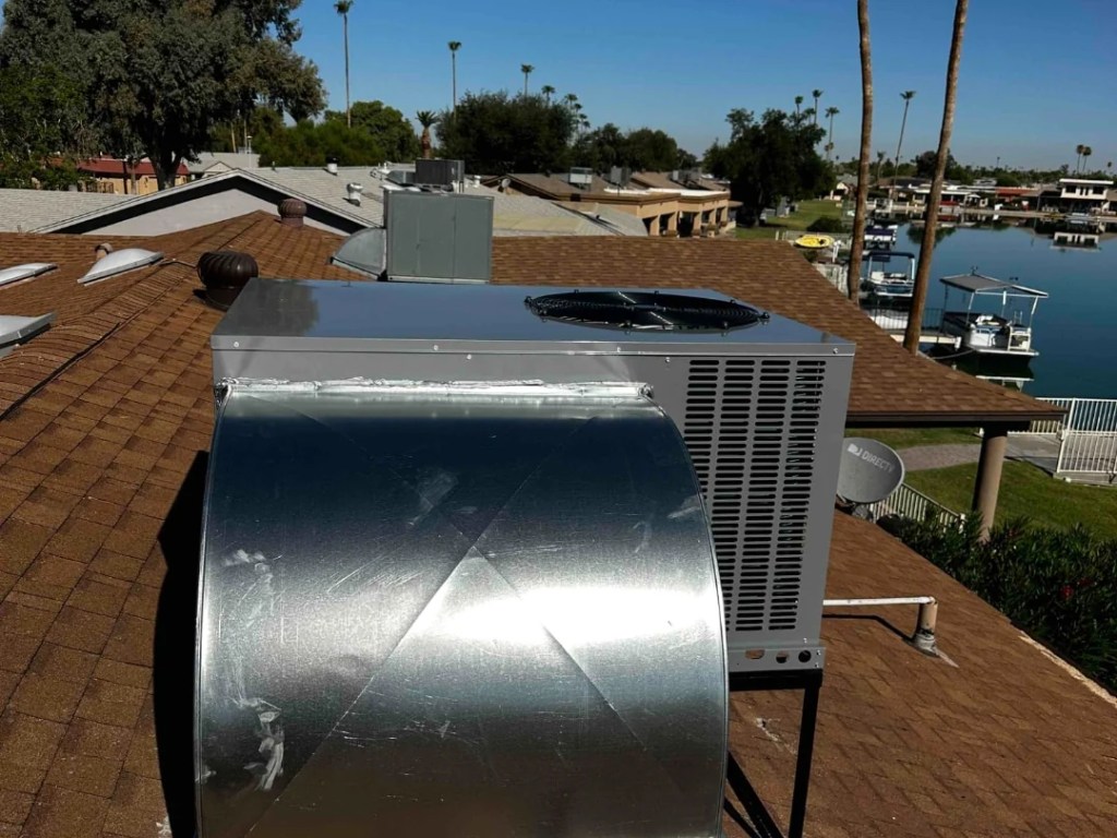 Technician inspecting commercial heating equipment