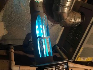 Ultraviolet air purifying lamp installed in a home air handler by AZ Perfect Comfort