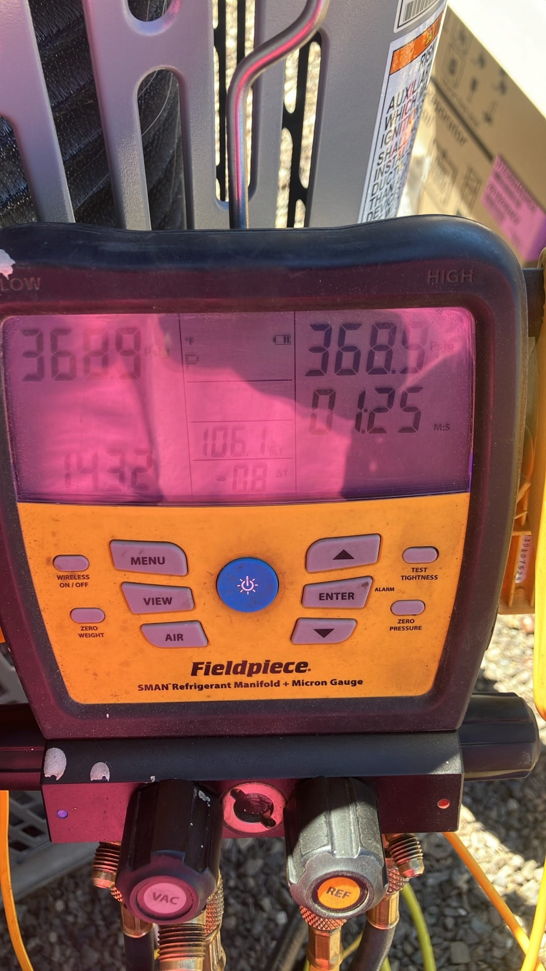 Digital manifold shows equalized pressures near 368 PSI on both sides during a nitrogen pressure test of the new system.