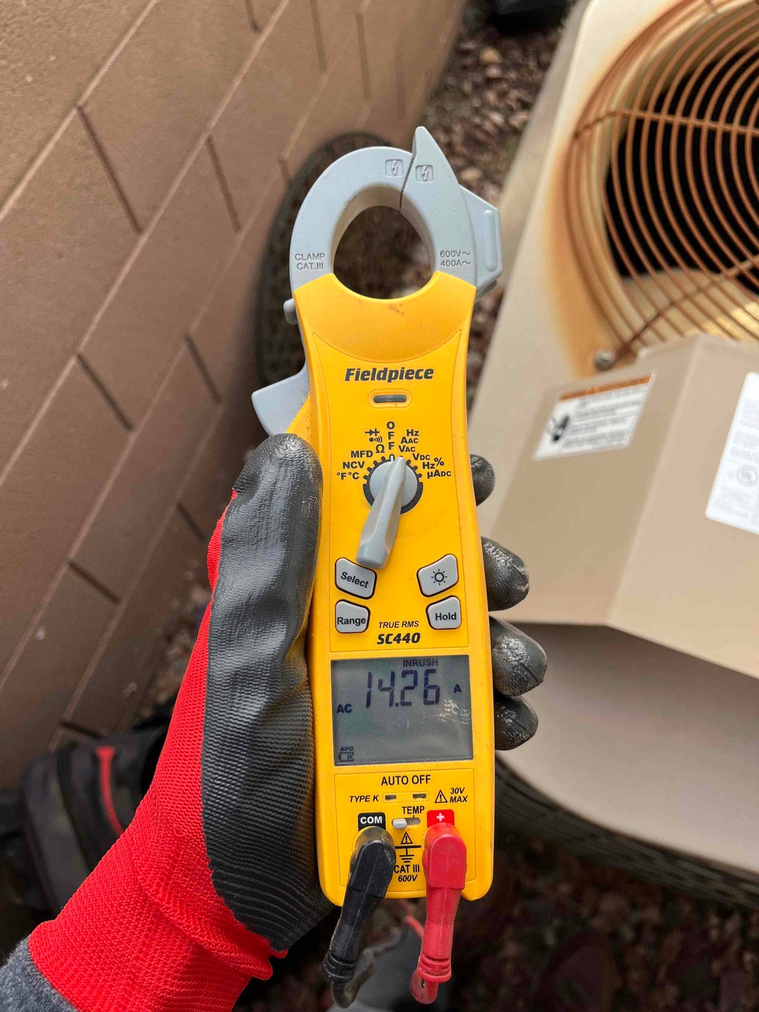 Diagnostic instrument display shows 14.26 A.