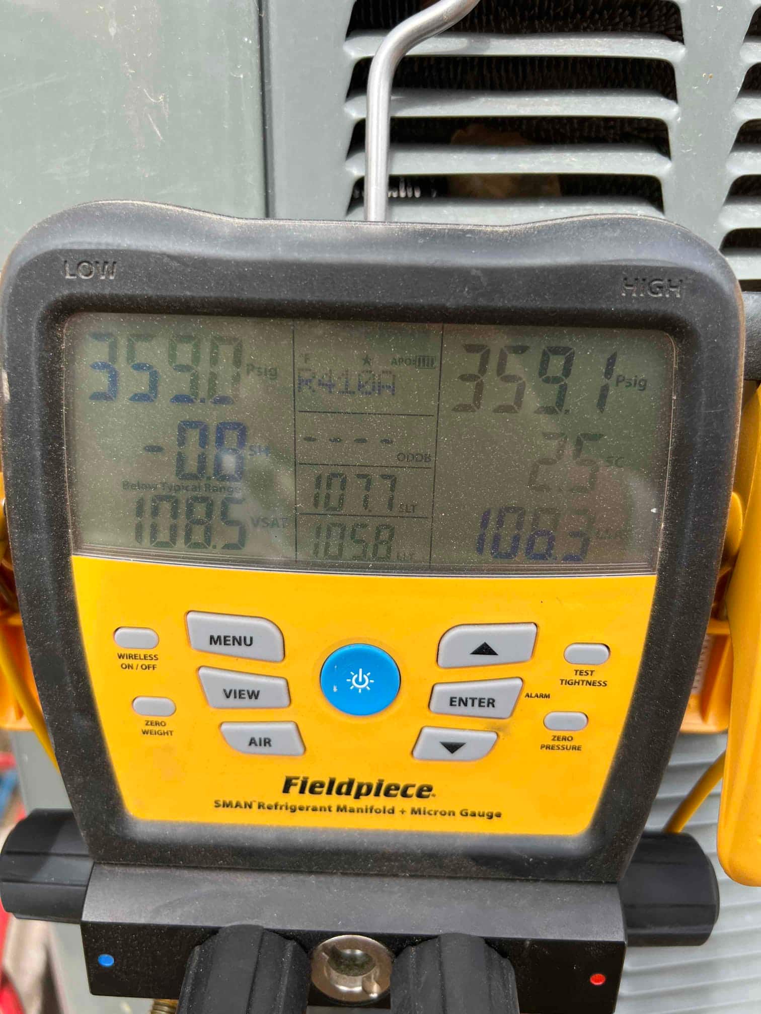 Digital manifold shows equal pressures around 359 PSI on both sides during a nitrogen pressure test of the new system.