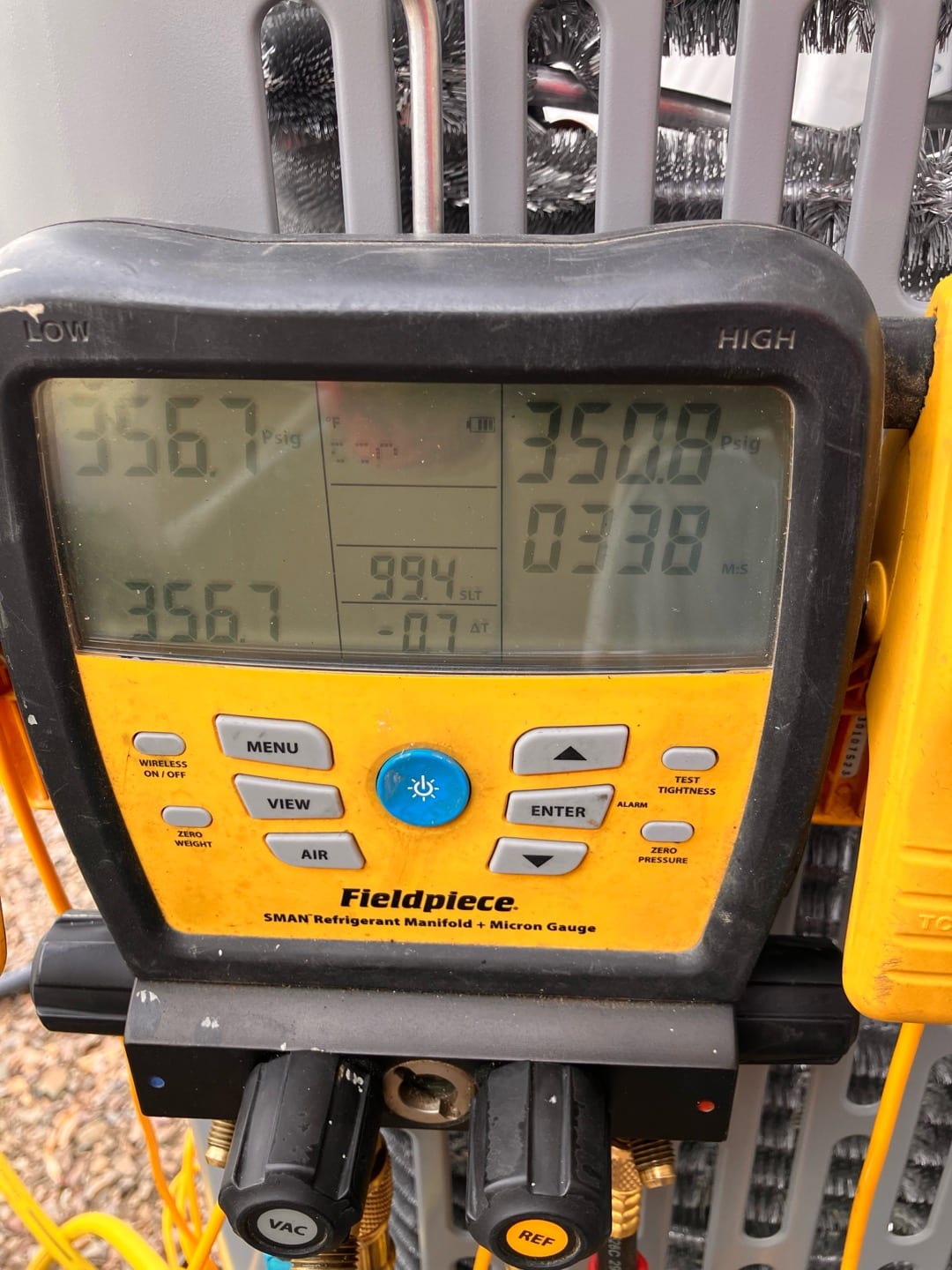Digital manifold shows equalized pressures around 356 and 351 PSI on both sides during a nitrogen pressure test.
