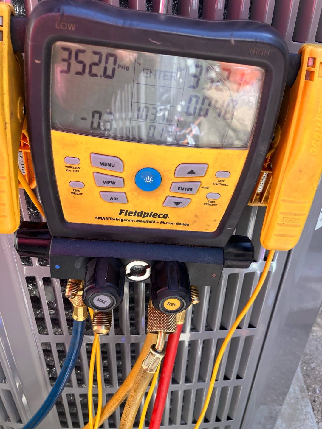 Digital manifold shows equal pressures around 352 PSI on both sides during a nitrogen pressure test of the new system.
