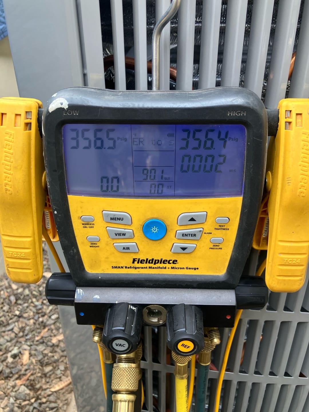 Digital manifold shows equal pressures around 356 PSI on both sides during a nitrogen pressure test of the new system.