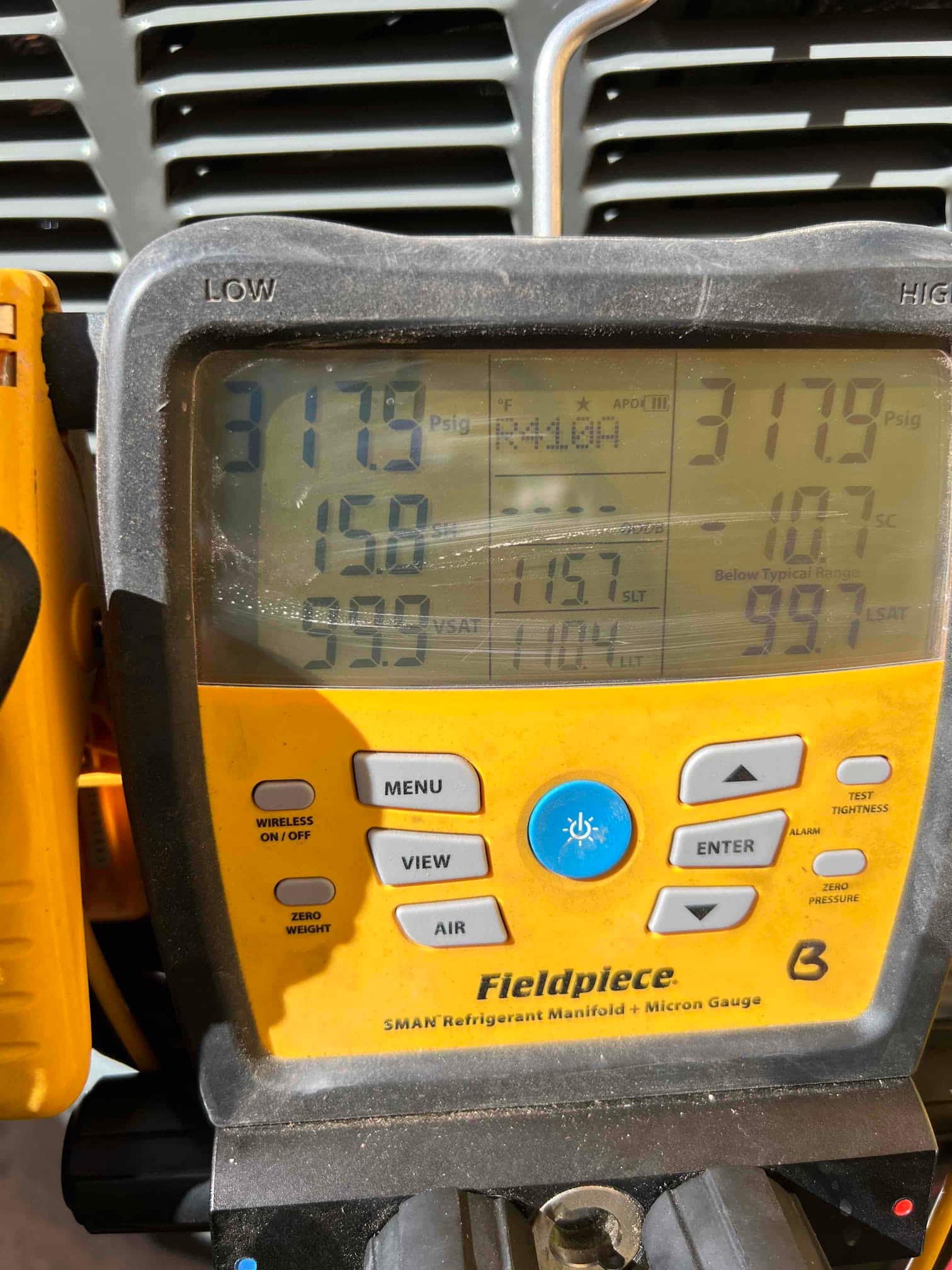 Digital manifold shows equal pressures at 3179 PSI on both low and high sides during a nitrogen pressure test.