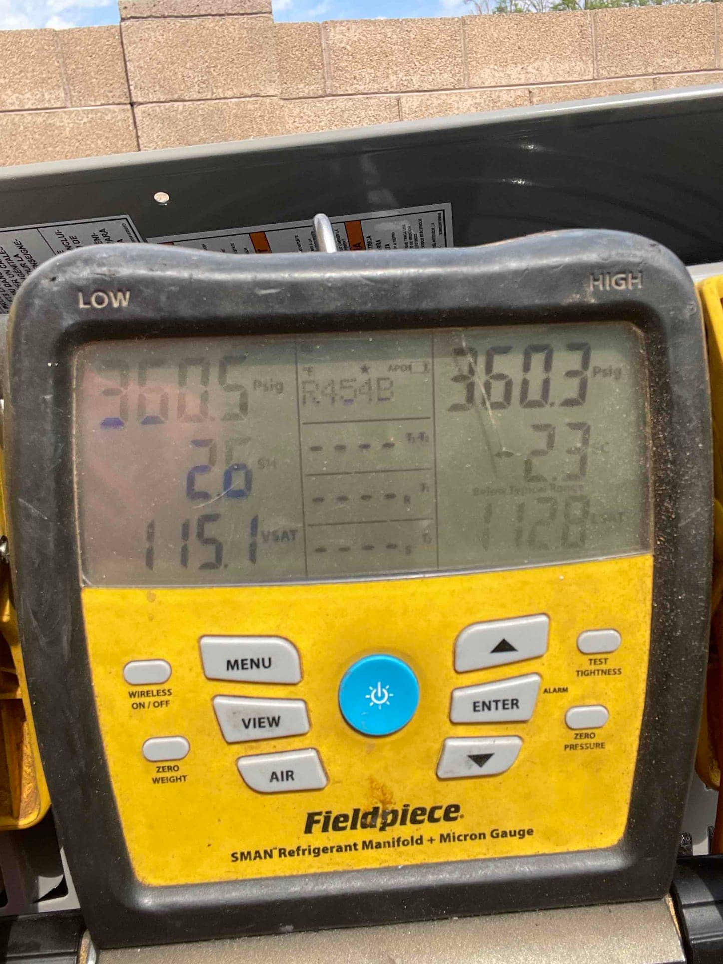 Digital manifold shows equal pressures around 360 PSI on both sides during a nitrogen pressure test. Refrigerant selection indicates R-454B.