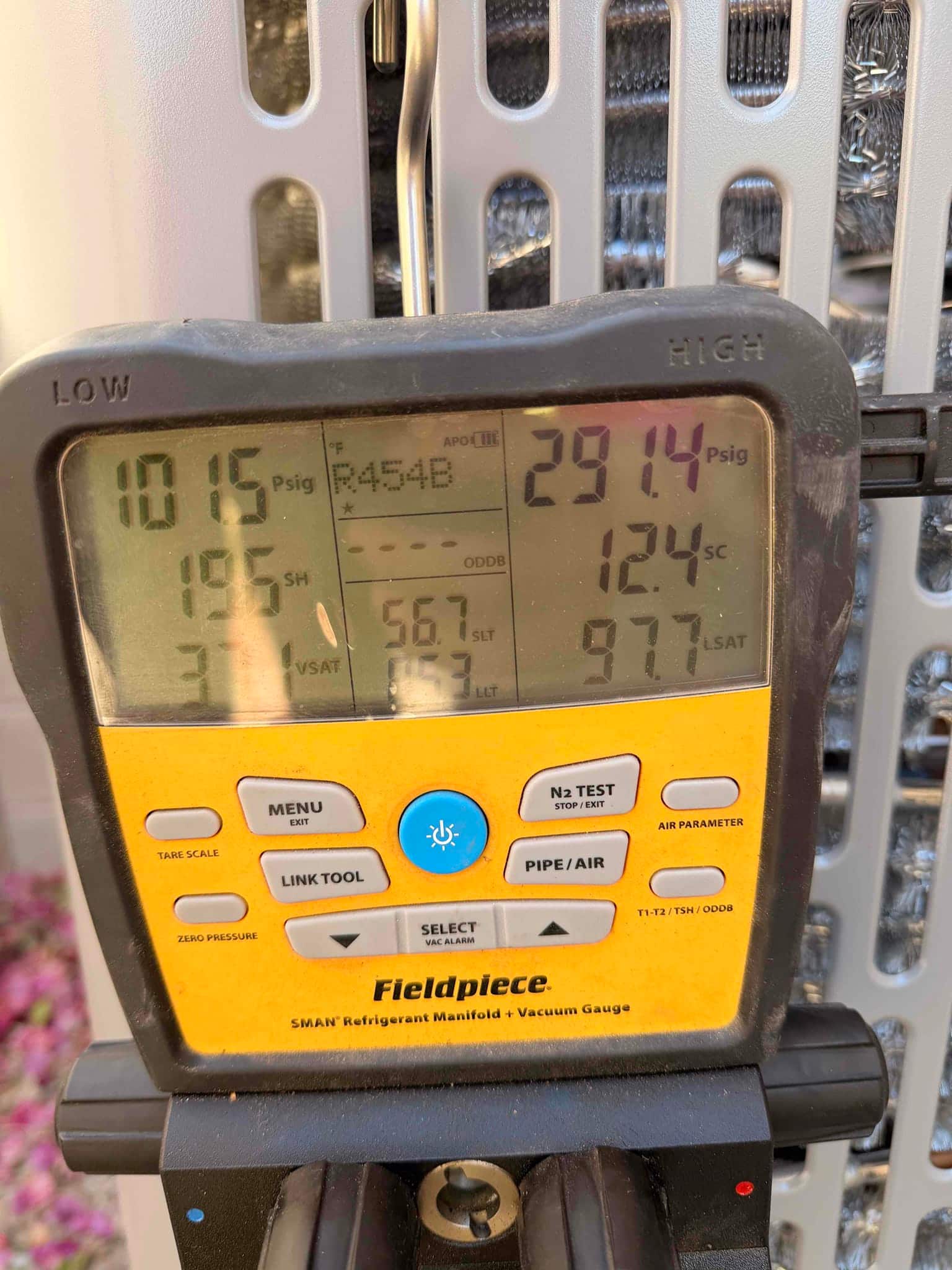 Digital manifold shows system operating pressures with R-454B selected, including suction 101 PSI and liquid 291 PSI, and subcooling 12.4.