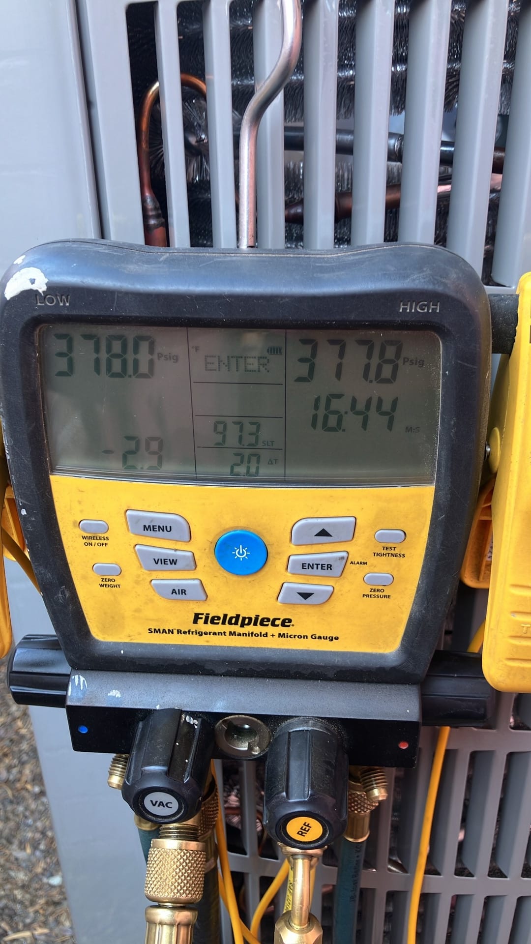 Digital manifold shows both high and low sides holding around 378 PSI during the nitrogen pressure test on the new system.