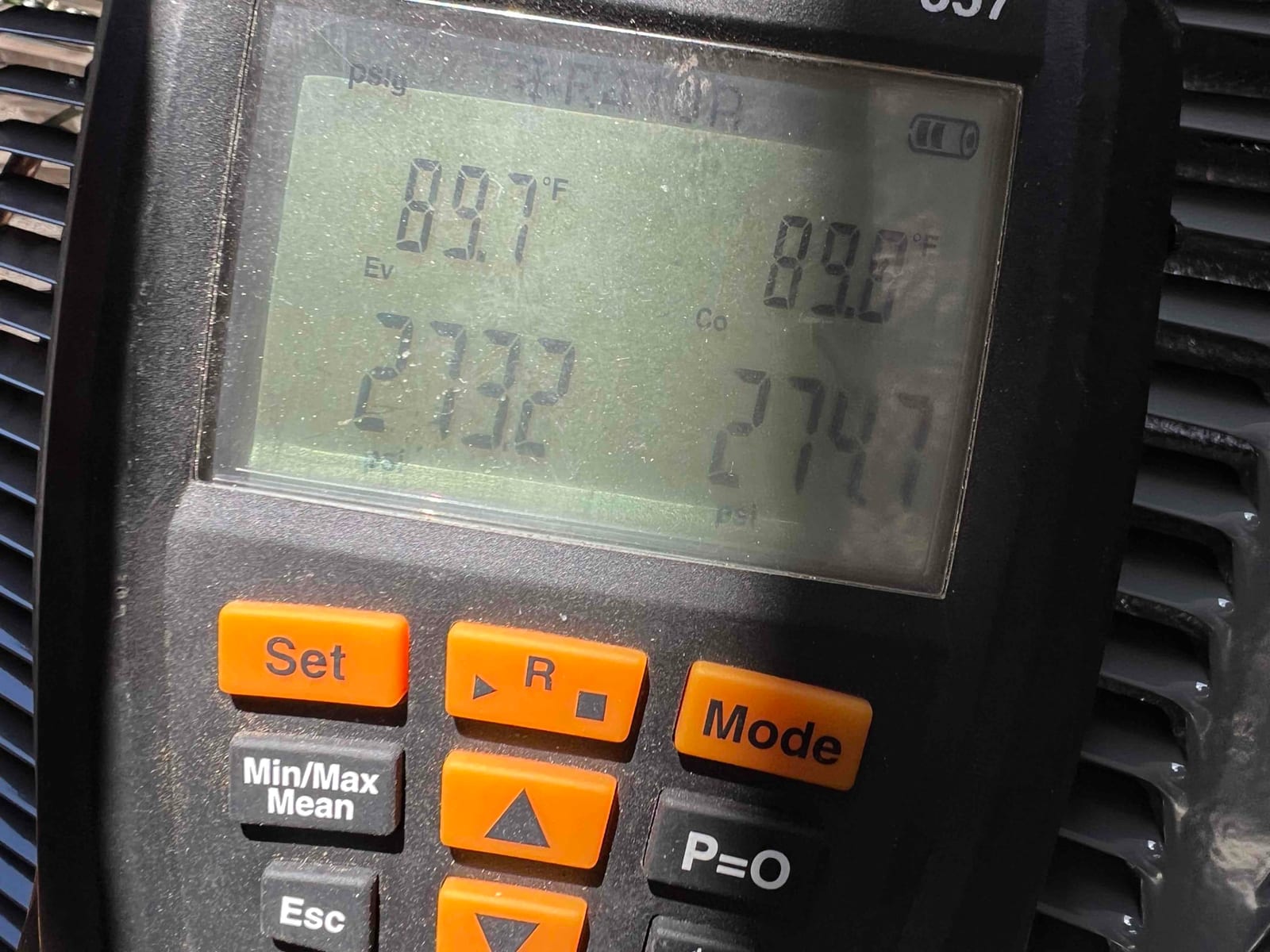 Digital manifold shows both sides holding around 274 psi during a nitrogen pressure test on the newly installed system.