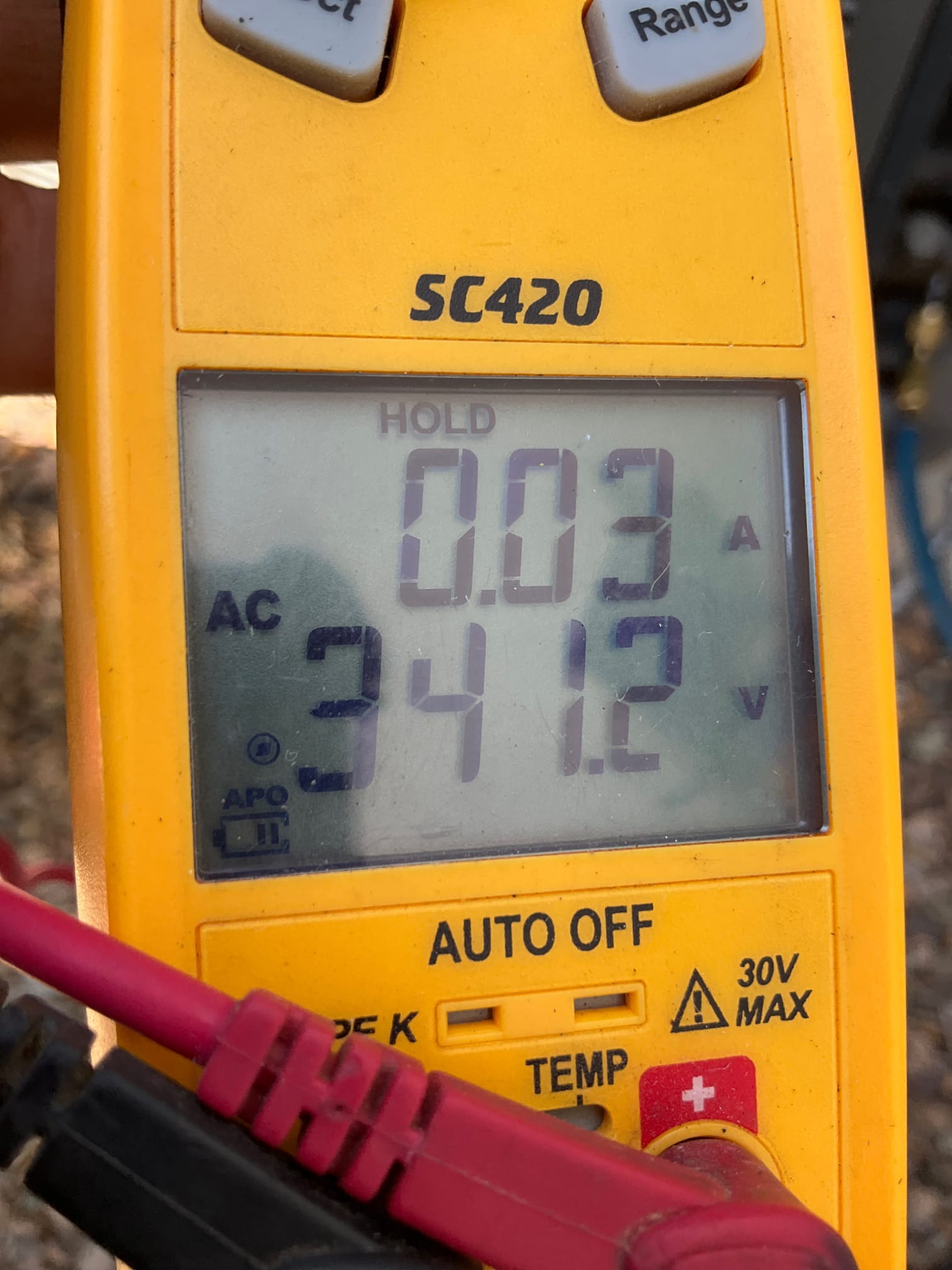 HVAC diagnostic instrument photographed during the service visit.