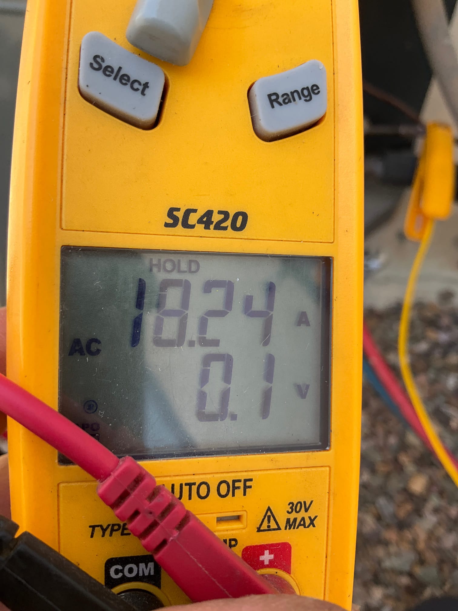 HVAC diagnostic instrument photographed during the service visit.