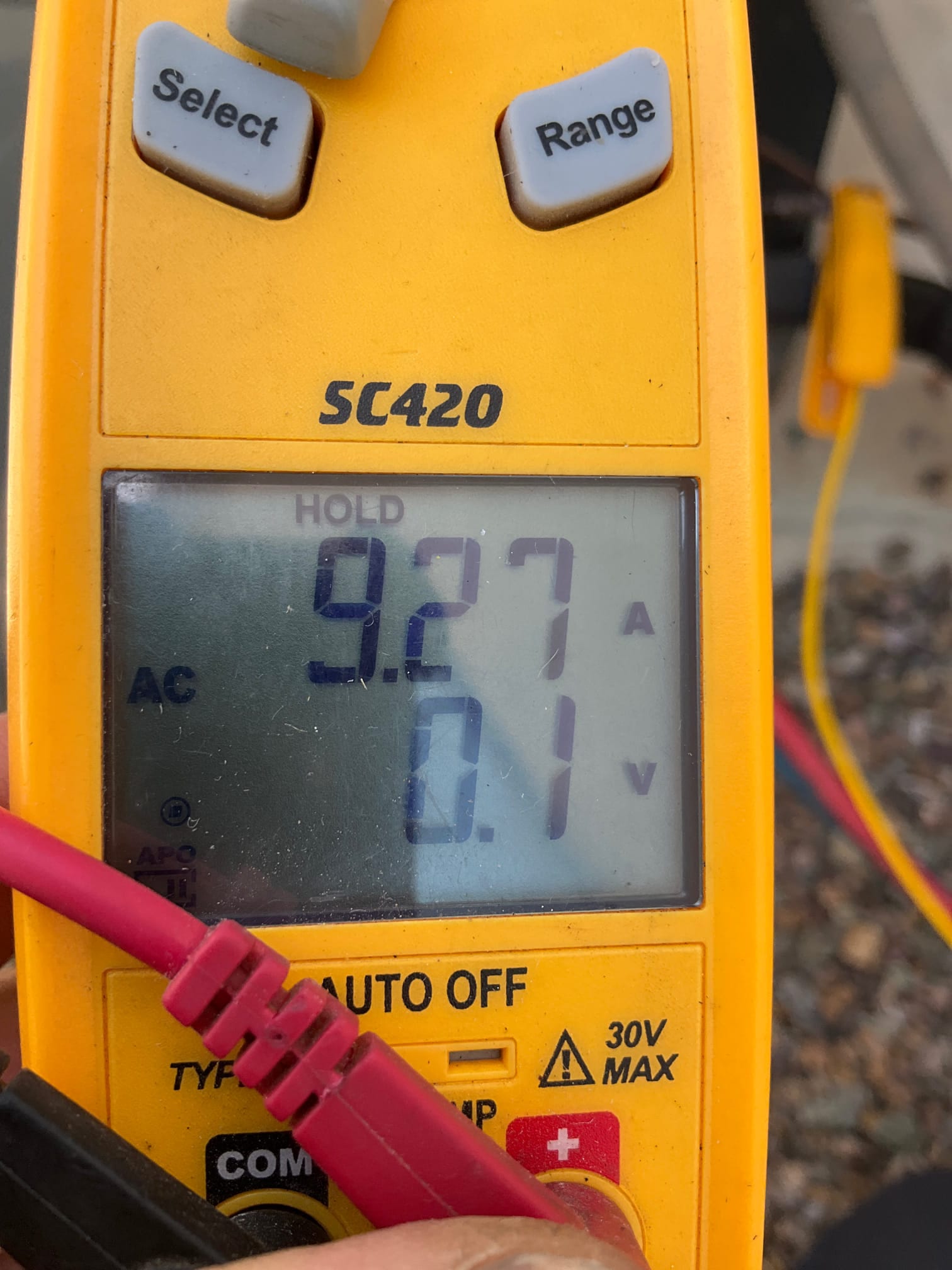 HVAC diagnostic instrument photographed during the service visit.