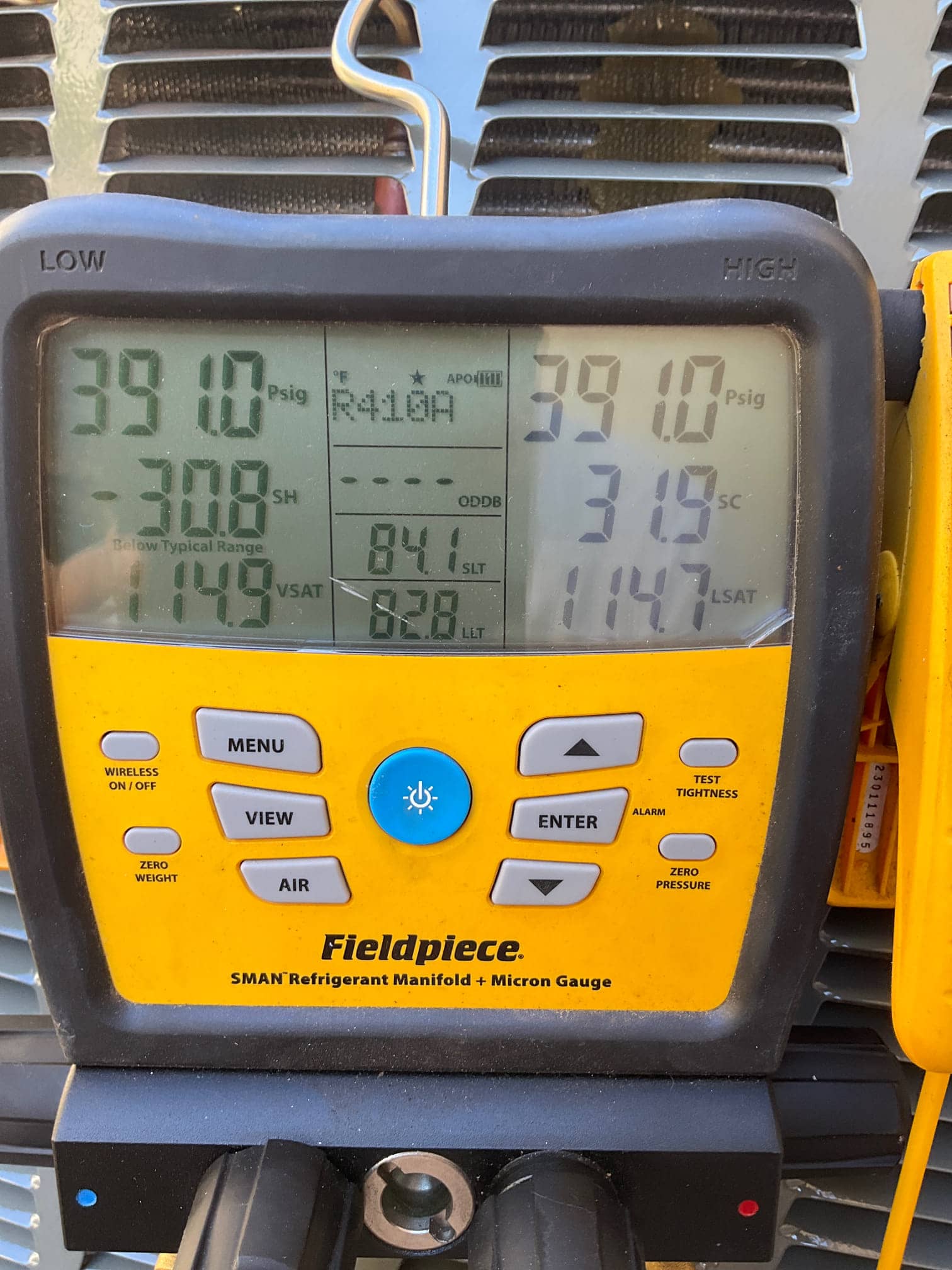 Digital manifold shows both low and high sides at 391 PSI during a nitrogen pressure test on the new system.