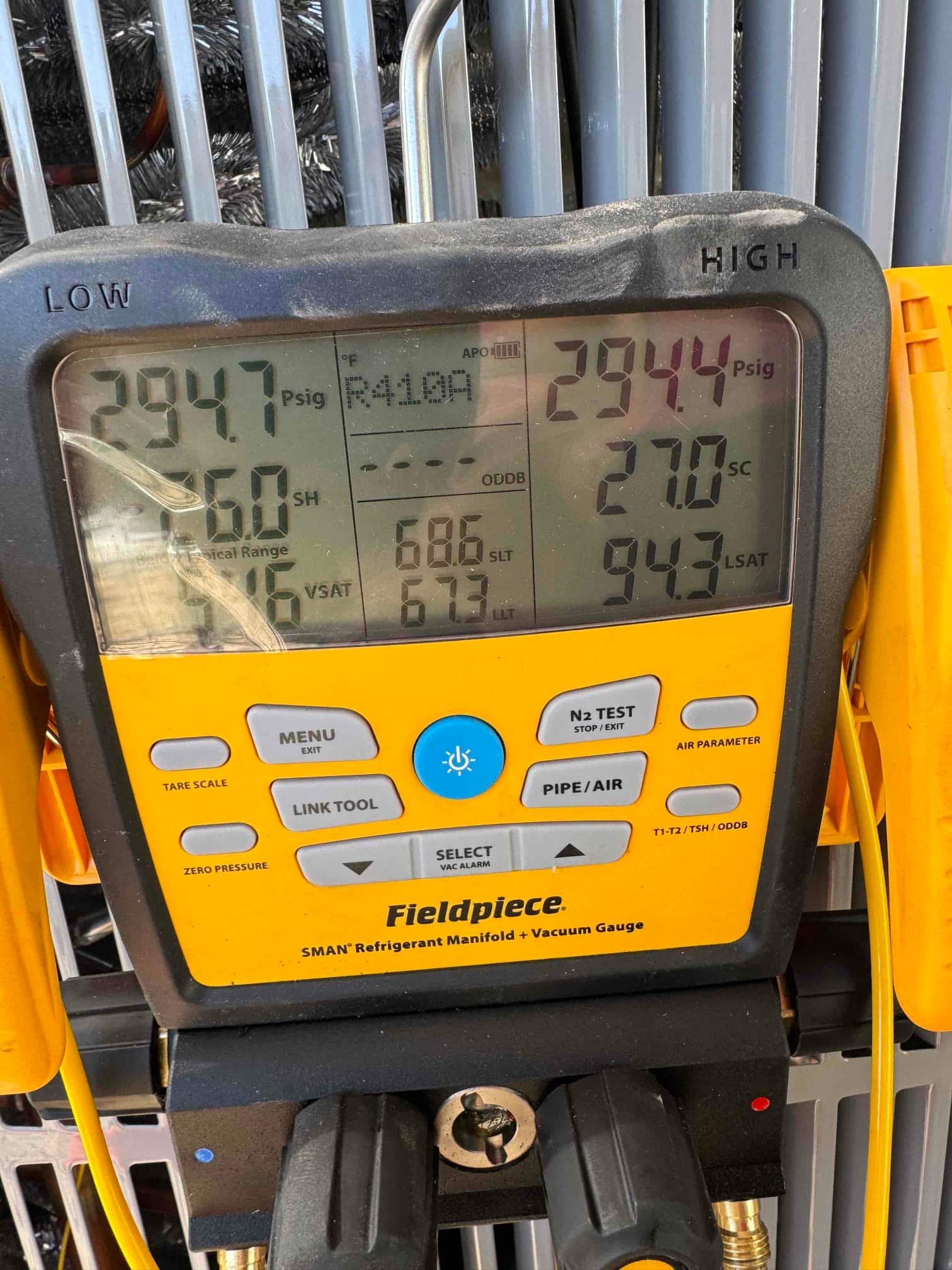 Digital manifold shows equal pressures around 2945 PSI on both sides during a nitrogen pressure test of the new system.