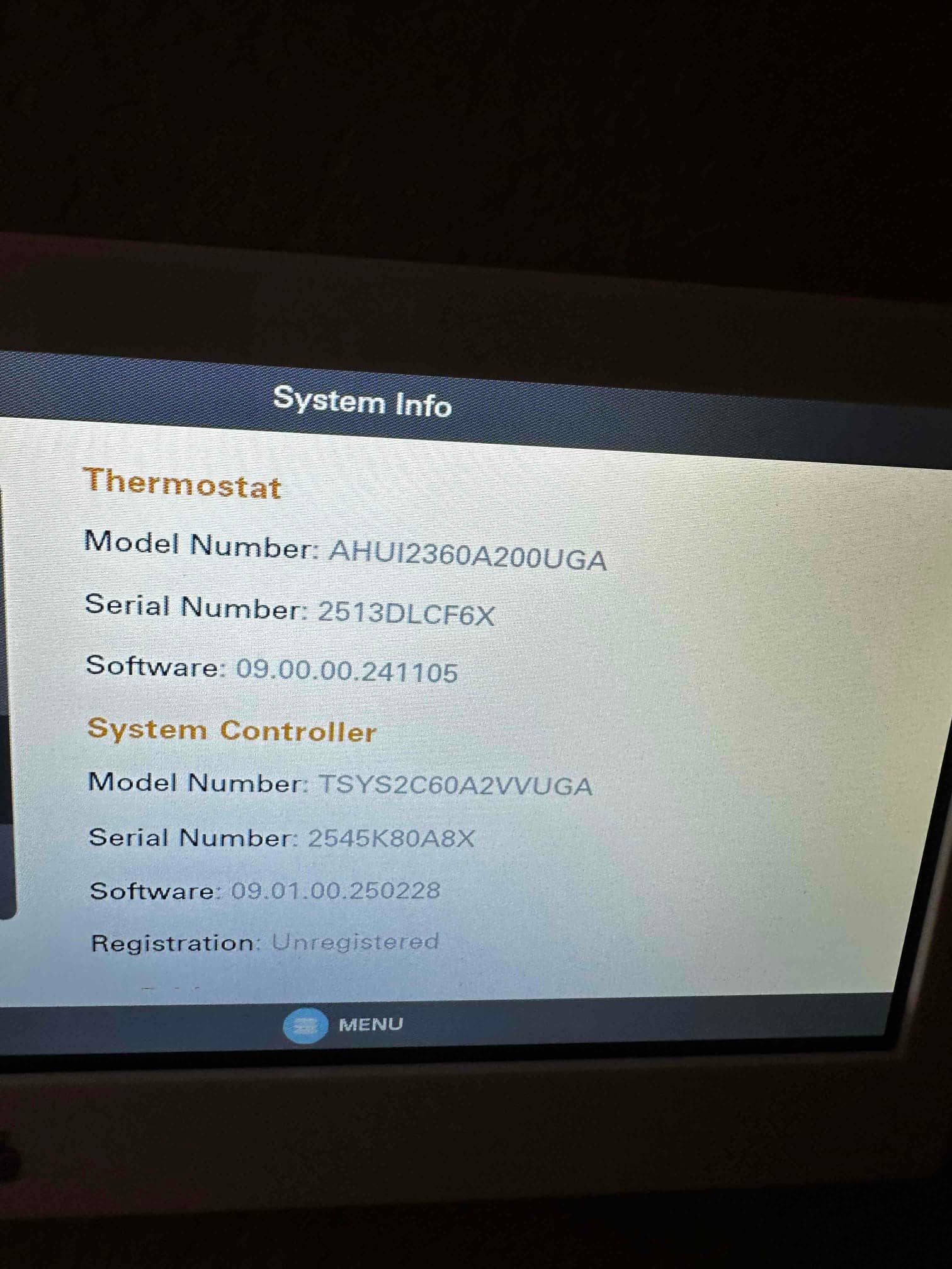 Thermostat screen displays system information for thermostat and system controller during setup at the installation site.