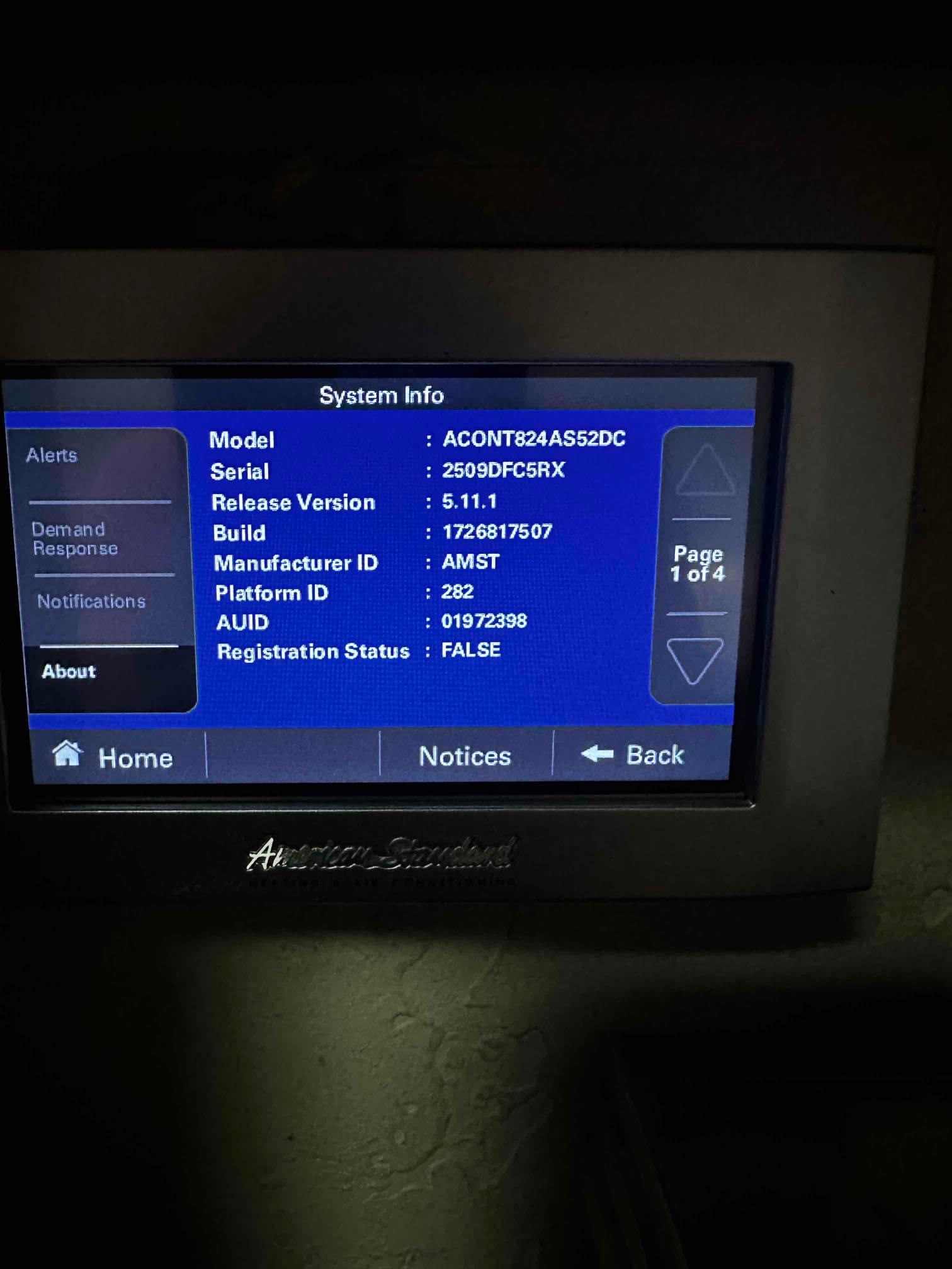 Thermostat system information screen displayed, showing model, serial, software version, and other controller details.