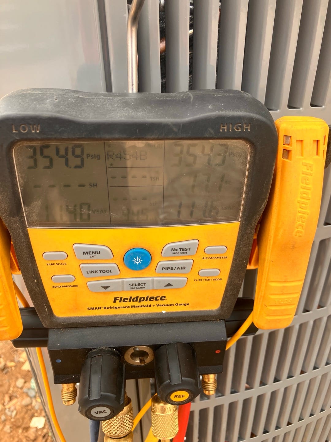 Digital manifold shows equal pressures around 355 PSI on both sides during a nitrogen pressure test of the new system.