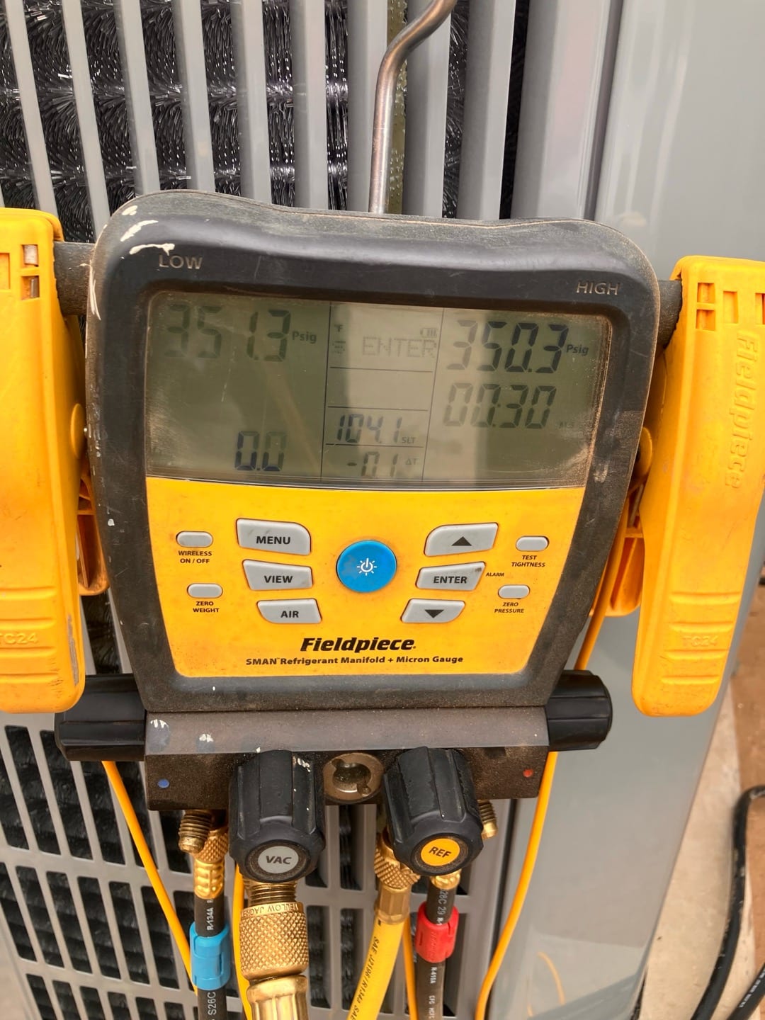 Digital manifold shows equalized pressures around 351 PSI on both sides during a nitrogen pressure test of the new system.