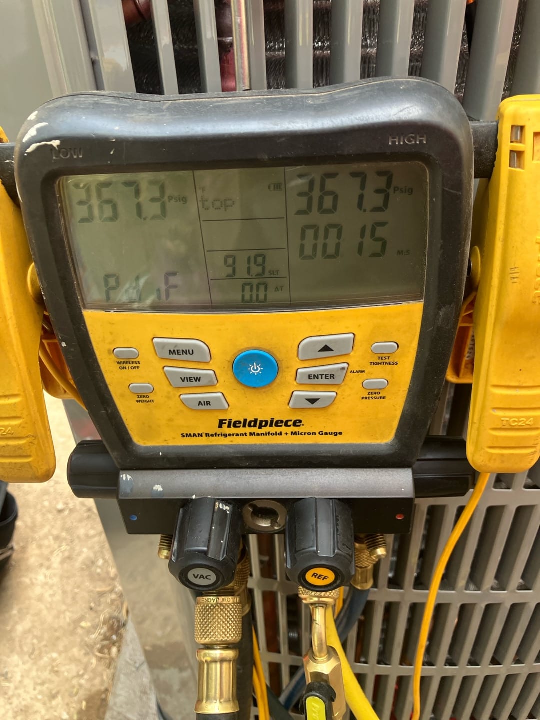Digital manifold shows both high and low sides at 367 PSI during a nitrogen pressure test on the newly installed system.