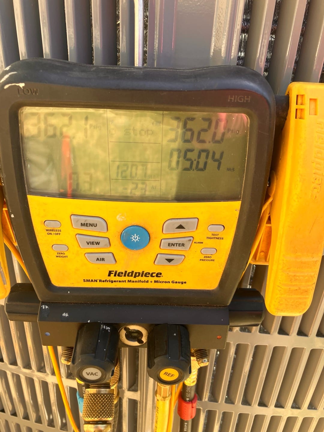 Digital manifold shows equal pressure near 362 PSI on both sides during a nitrogen pressure test of the new system.
