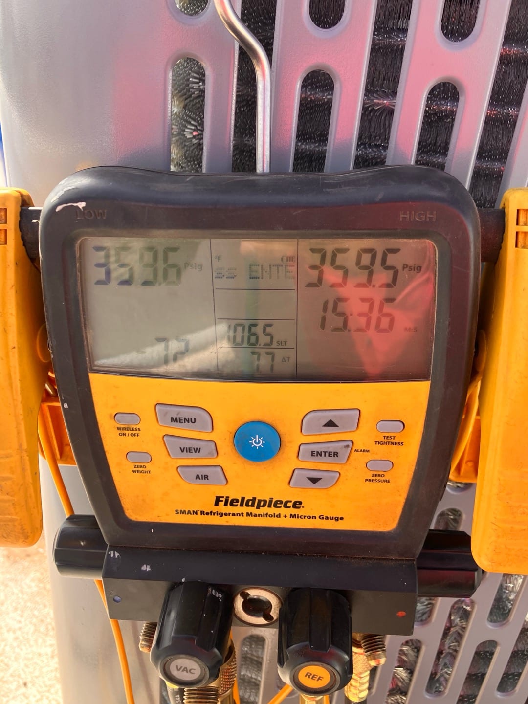 Digital manifold shows both high and low sides steady around 360 PSI during a nitrogen pressure test on the new system.