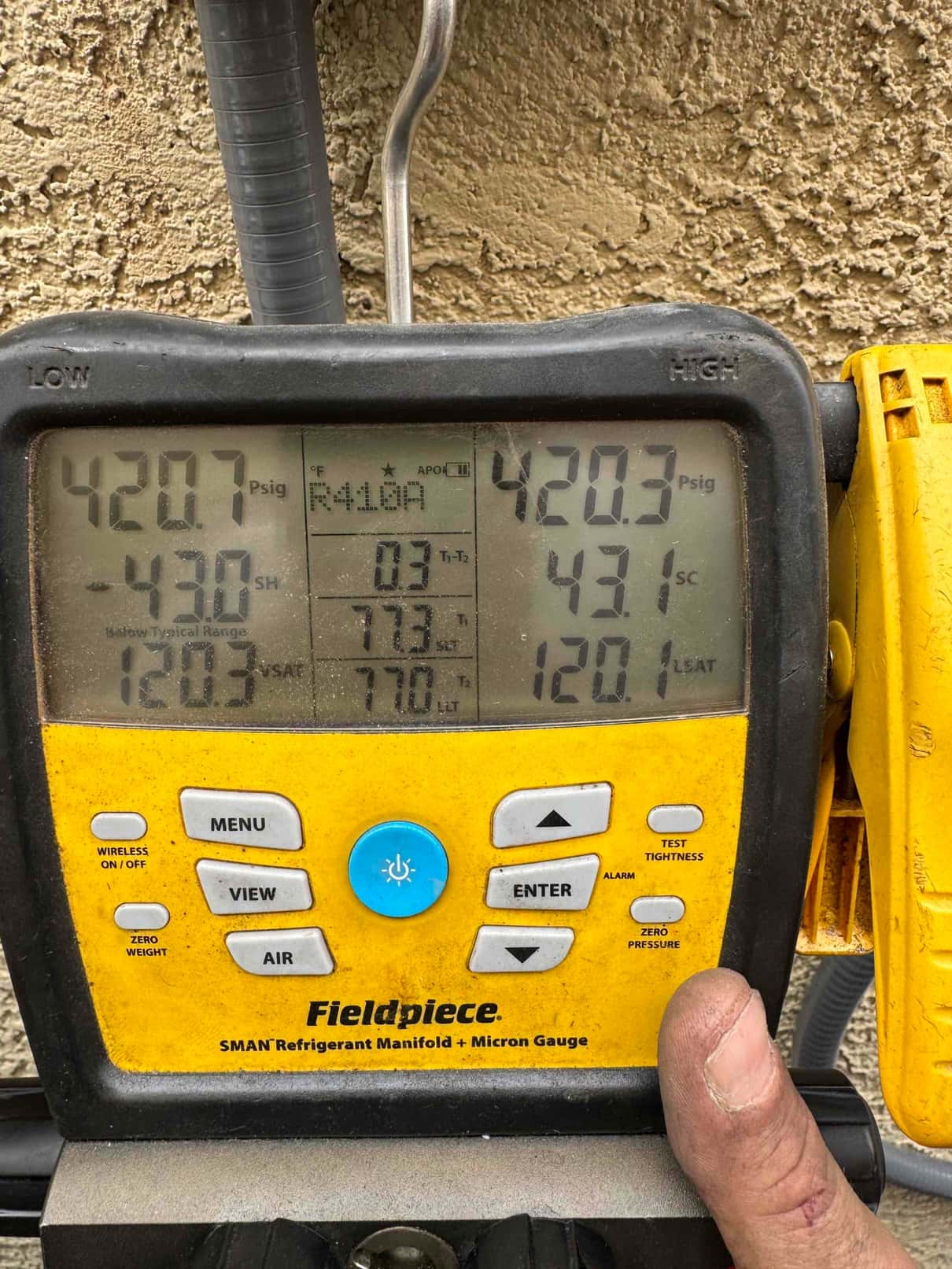 Digital manifold shows equal pressures near 420 PSI on both sides, documenting a nitrogen pressure test of the new system.