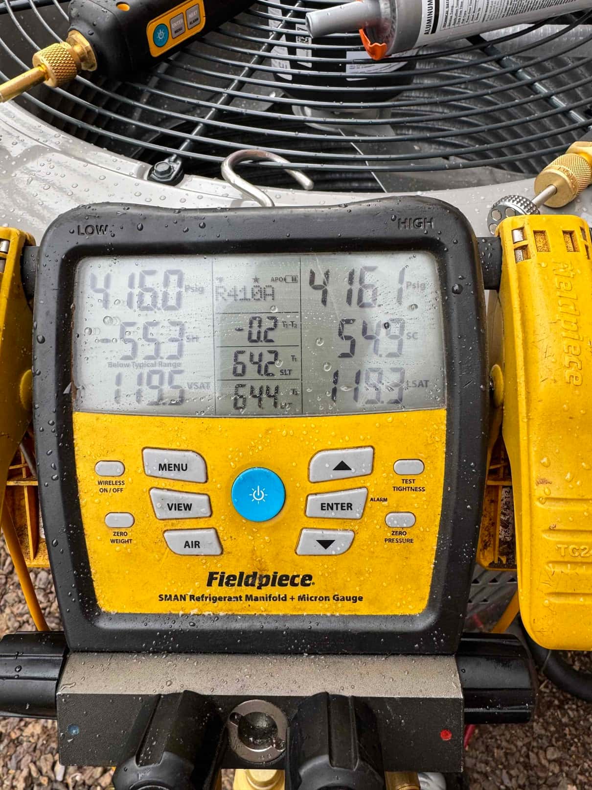 Digital manifold shows equal pressures near 416 PSI on both sides during a nitrogen pressure test of the new system.