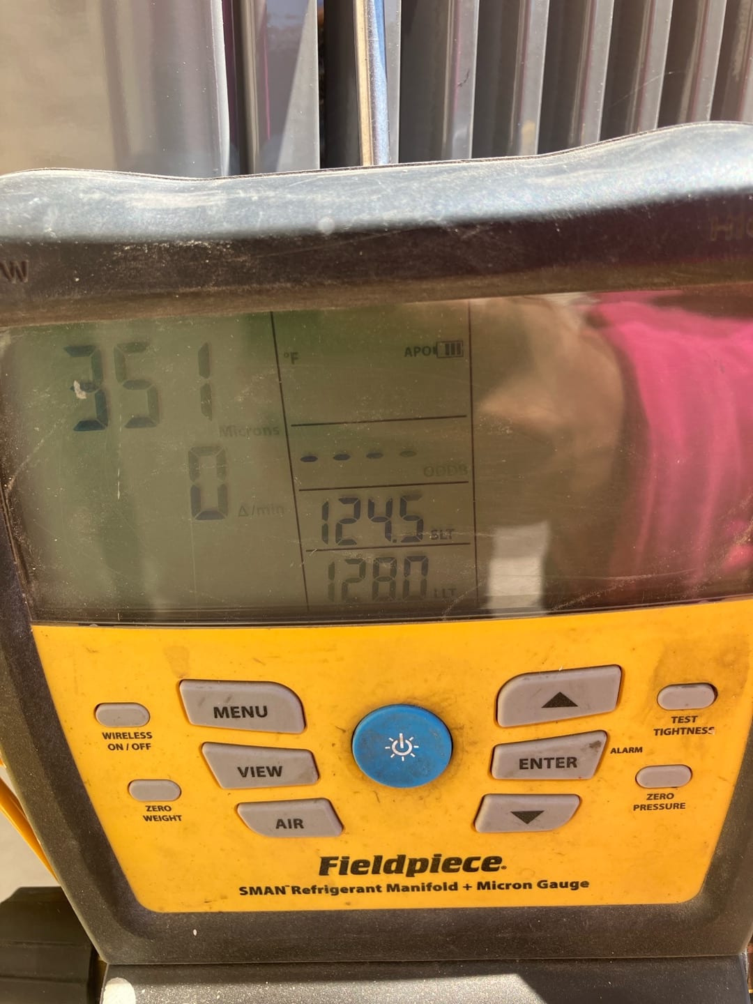 Digital manifold shows both sides equalized at 351 PSI, documenting a nitrogen pressure test on the new installation.