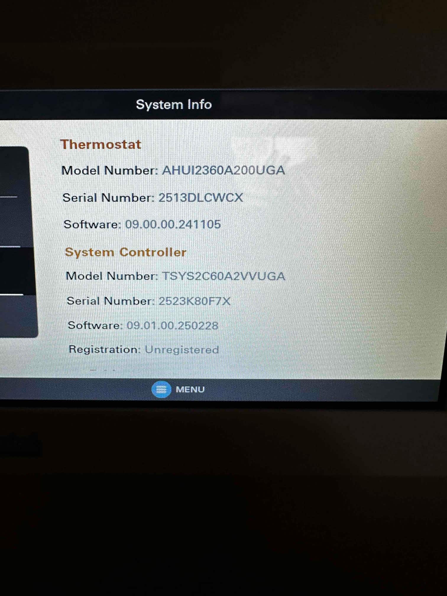 Thermostat system information screen displays model, serial numbers, and software versions after installation setup.