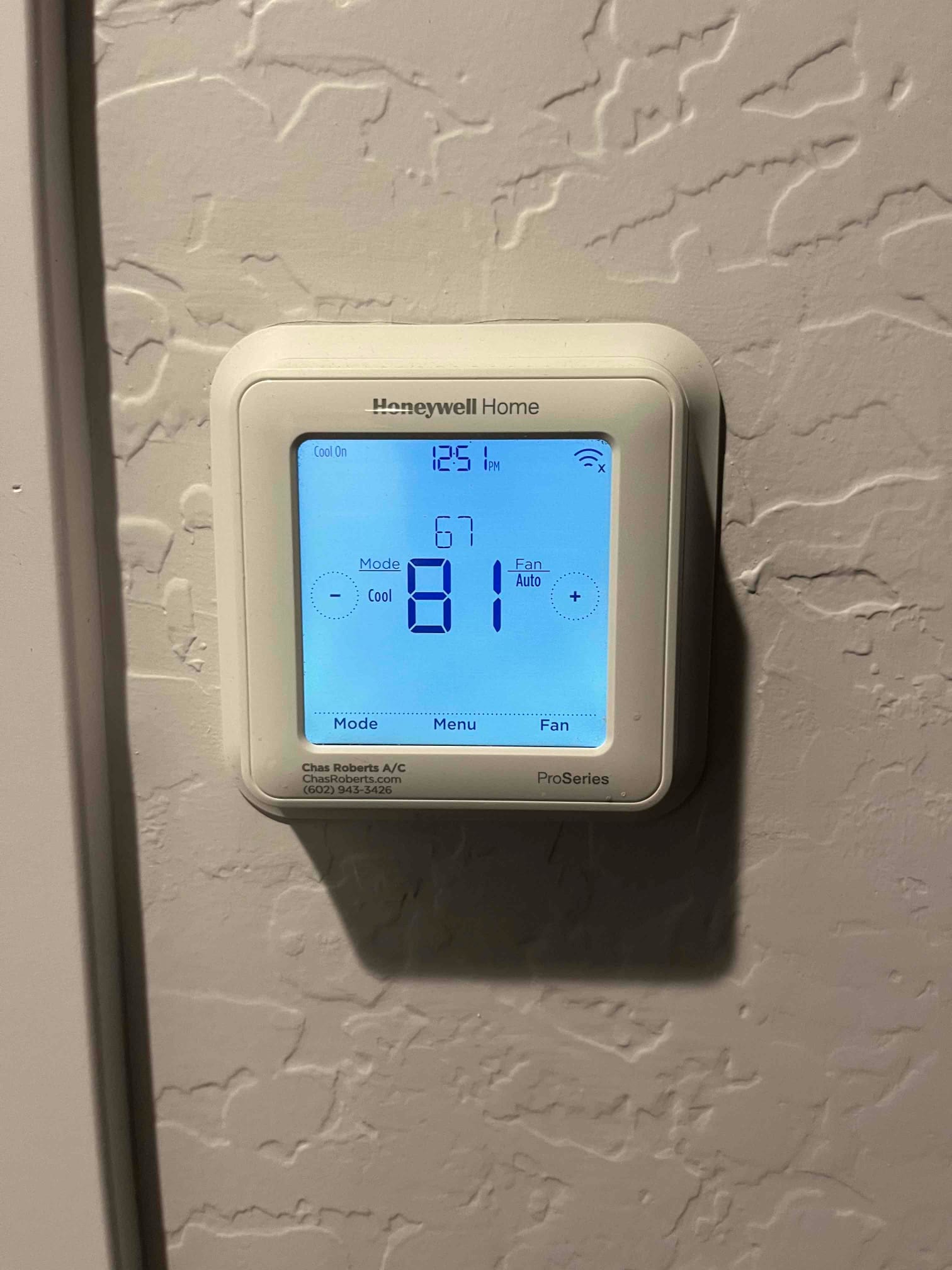 Thermostat display shows room temperature at 81°F, setpoint 67°F, cooling mode active with fan on auto.