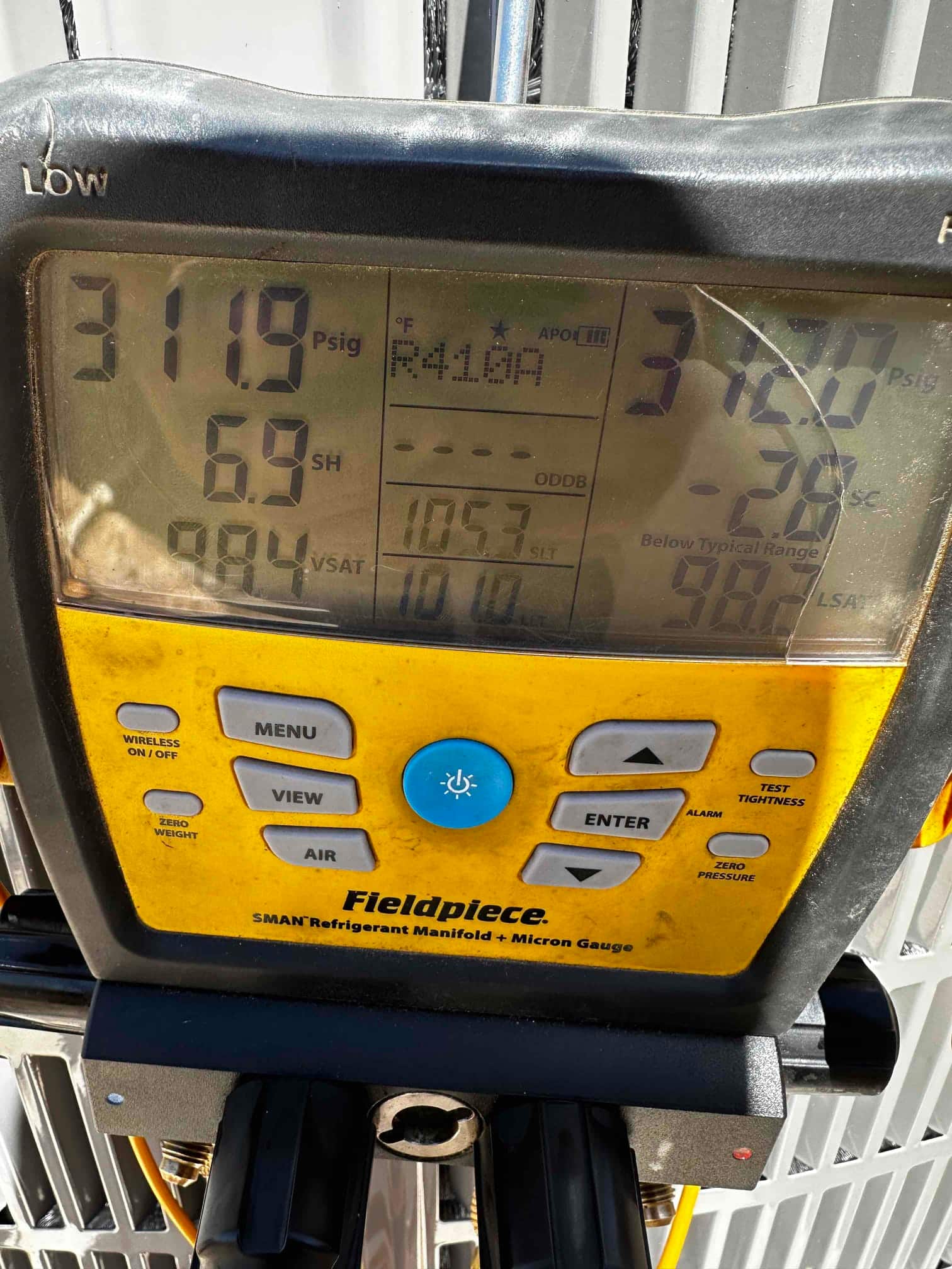 Digital manifold shows equal pressures around 312 PSI on both sides during a nitrogen pressure test of the new system.