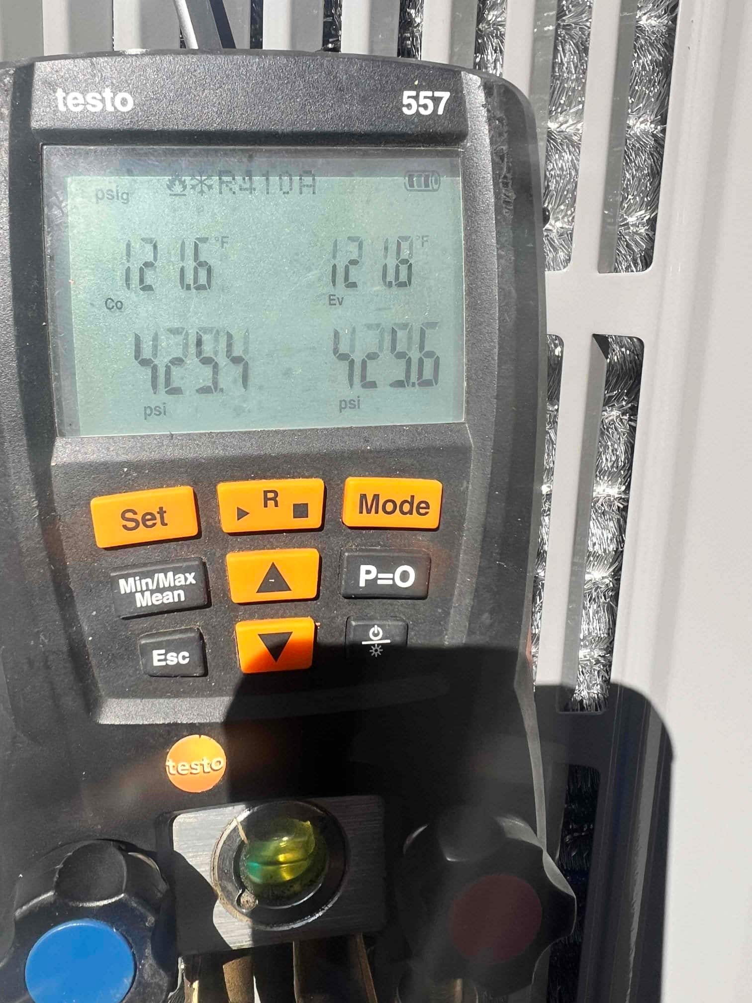 Digital manifold shows equal pressures around 429 PSI on both sides during a nitrogen pressure test of the system.