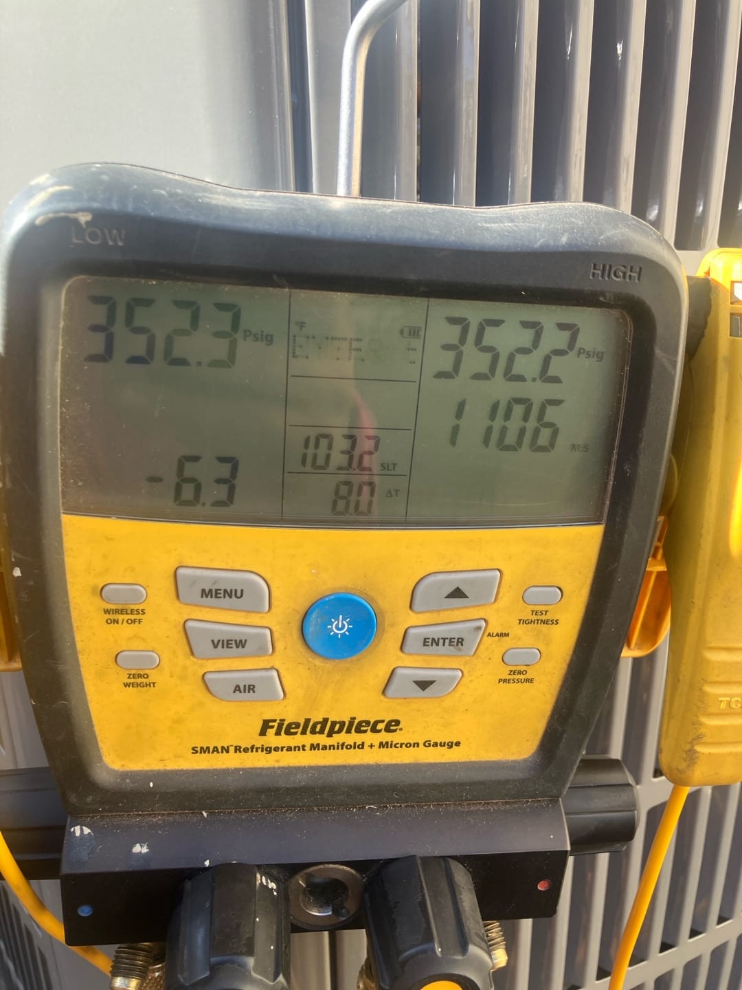 Digital manifold shows equal pressures around 352 PSI on both sides during a nitrogen pressure test of the new system.