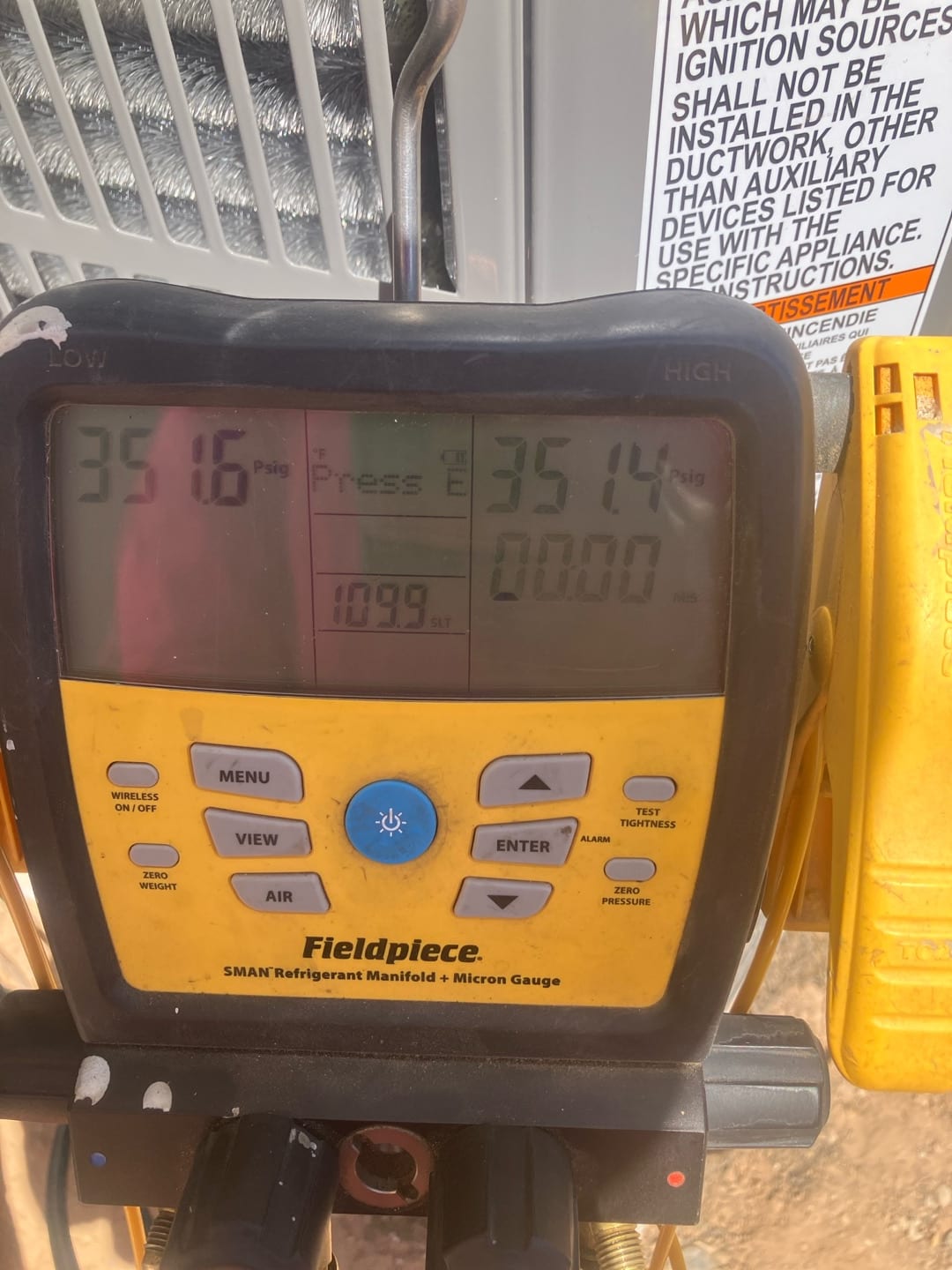 Digital manifold shows equal pressures around 351 PSI on both sides, documenting the nitrogen pressure test of the new system.