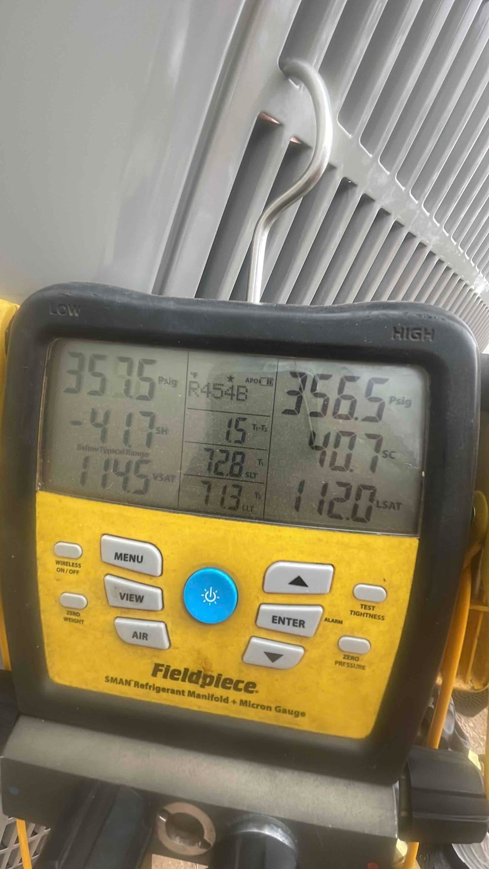 Digital manifold shows equalized pressures around 357 and 366 PSI on both sides during a nitrogen pressure test.
