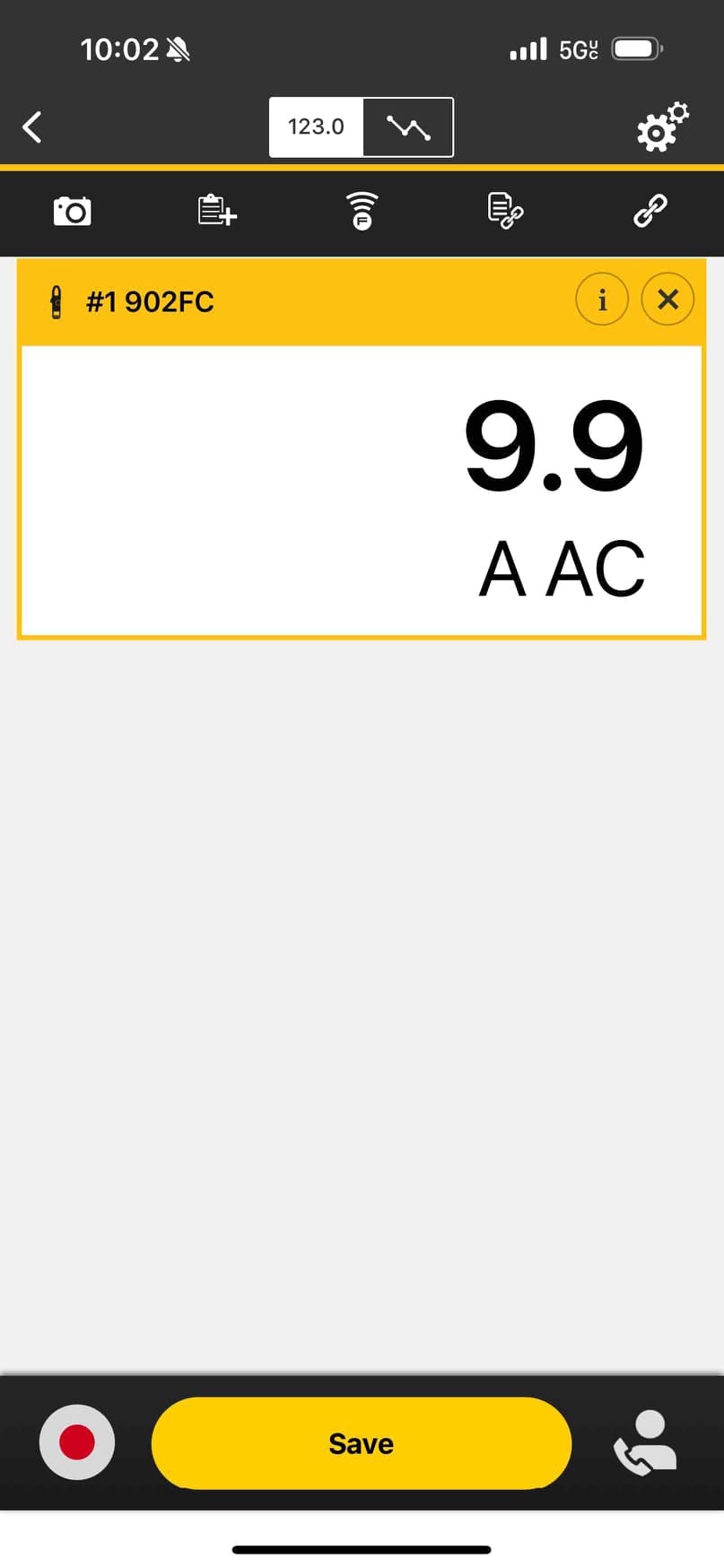 Digital clamp meter app display shows 9.9 A AC during an electrical current measurement on the HVAC system.