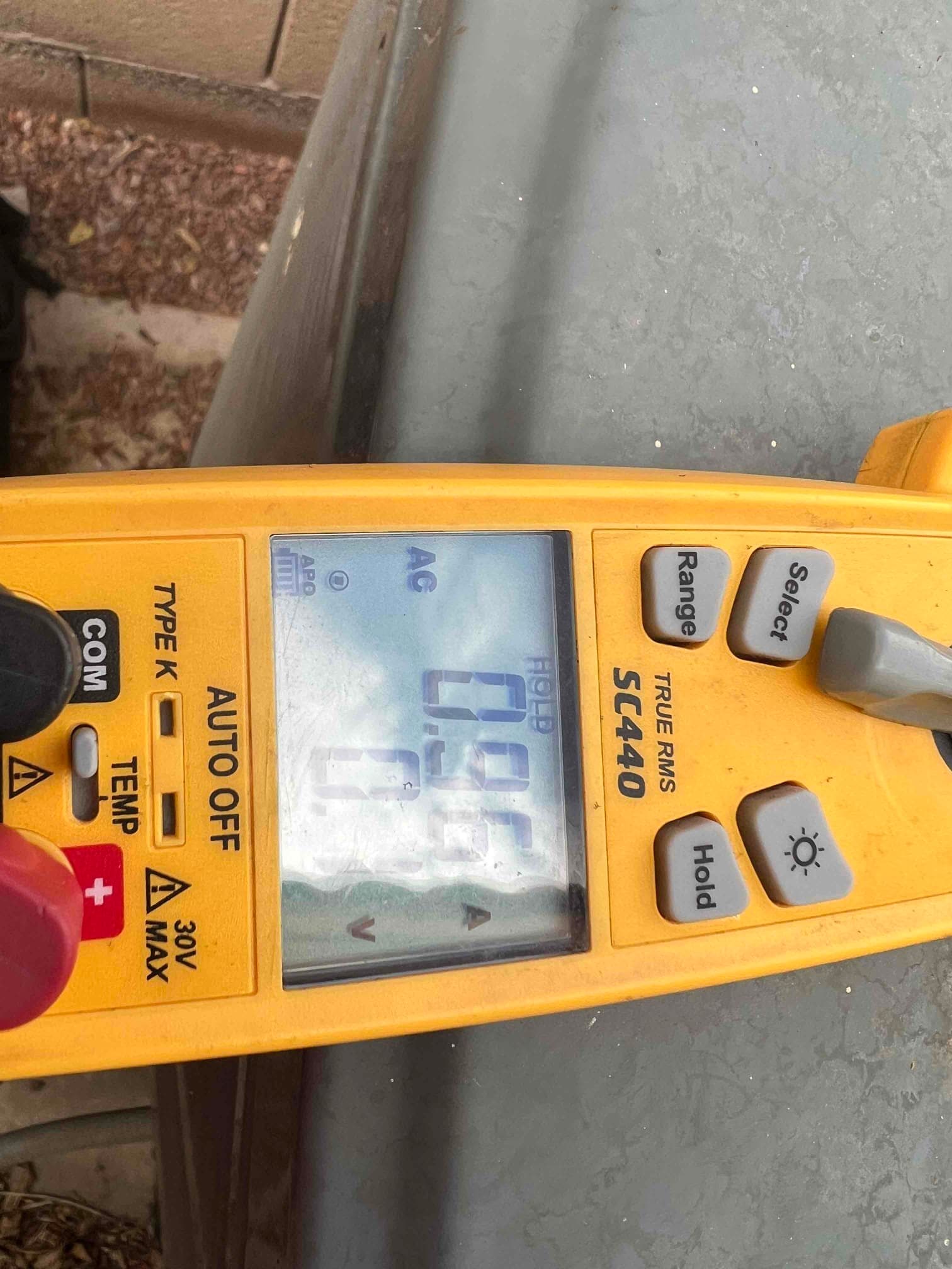 Diagnostic instrument display shows 0.96 A.