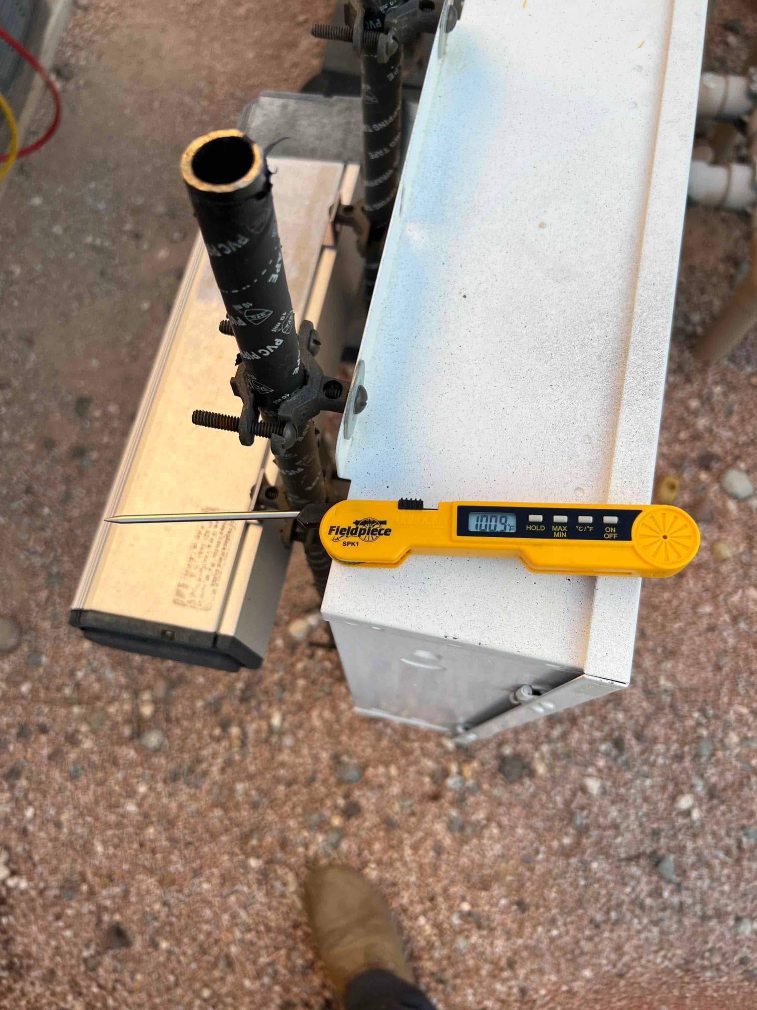 Diagnostic instrument display shows 100.8 °F.