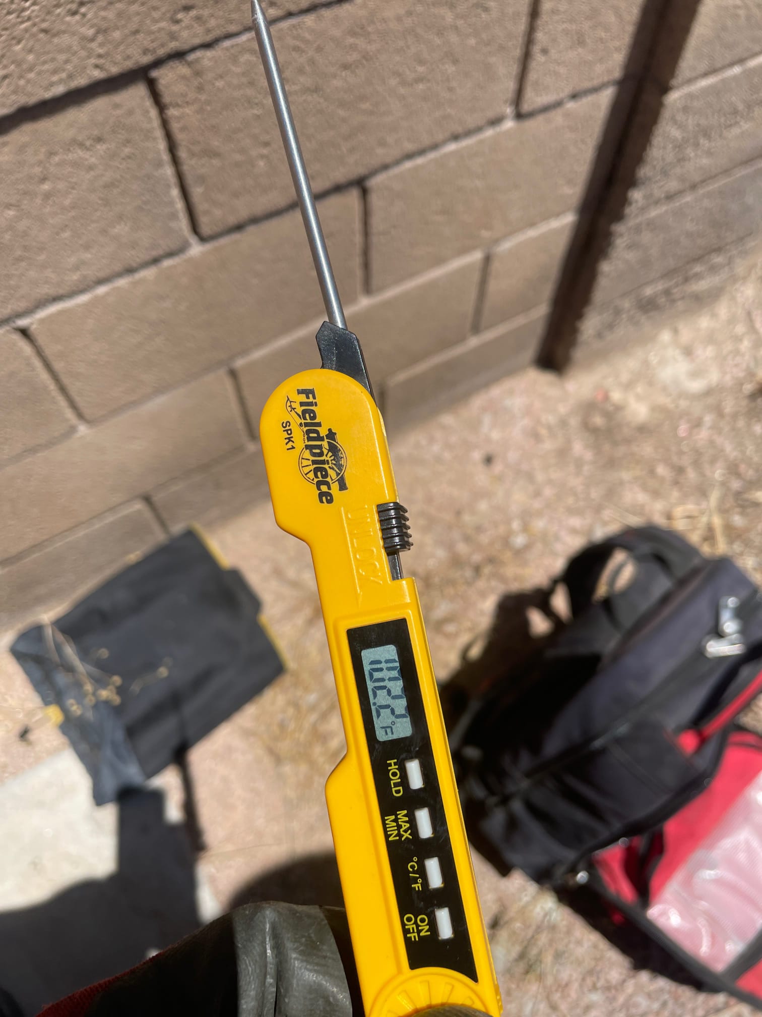 Diagnostic instrument display shows 102.3 °F.