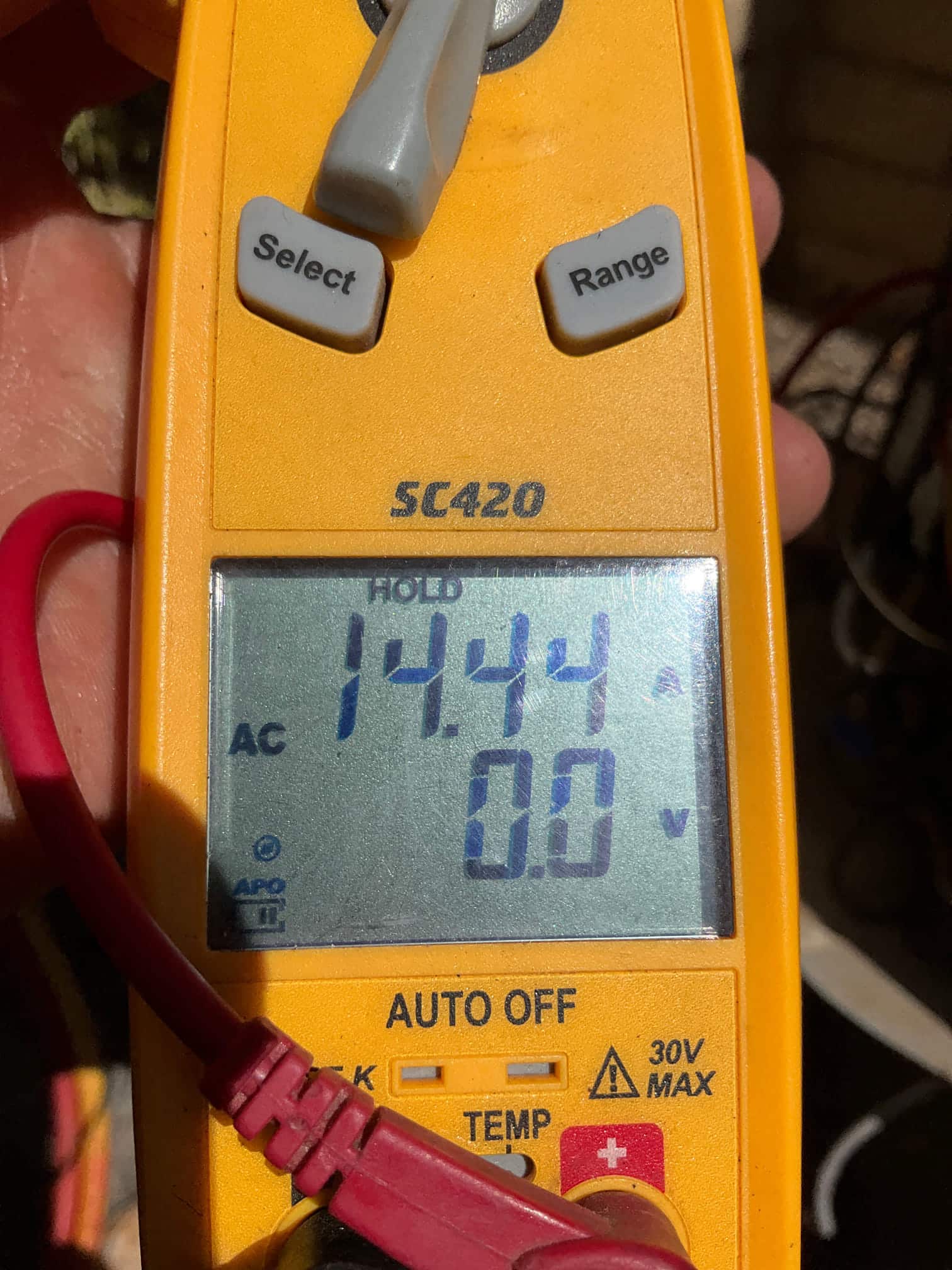 Diagnostic instrument display shows 14.44 A.