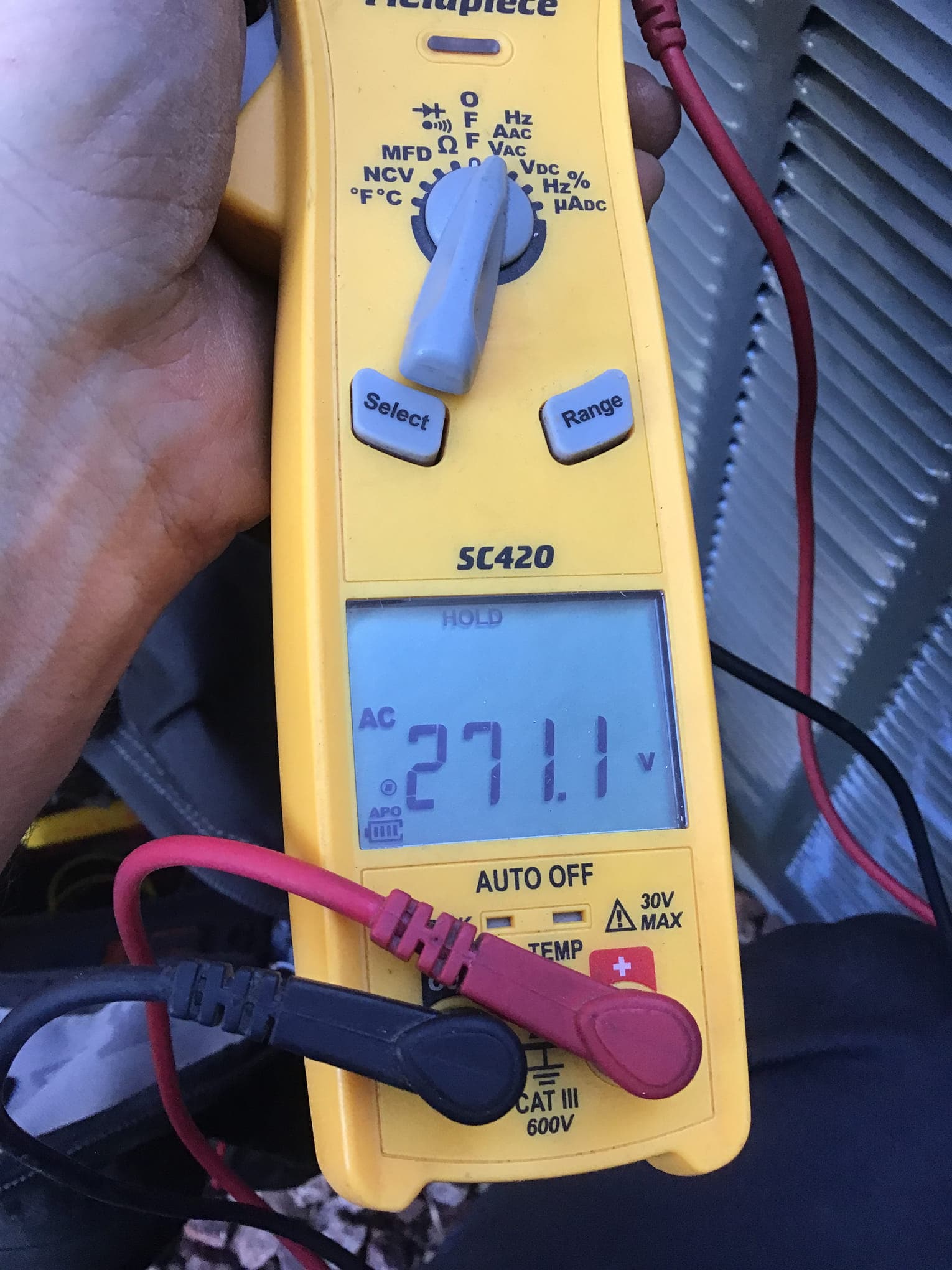 Diagnostic instrument display shows 271.1 V.