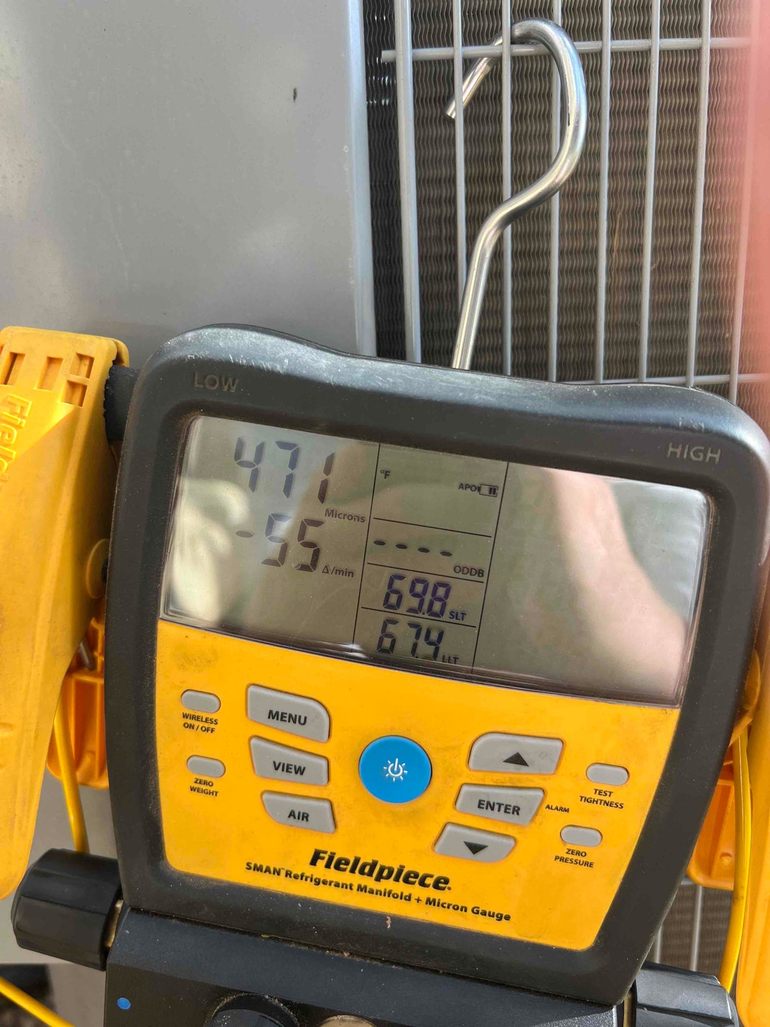 Diagnostic instrument display shows 471 microns.