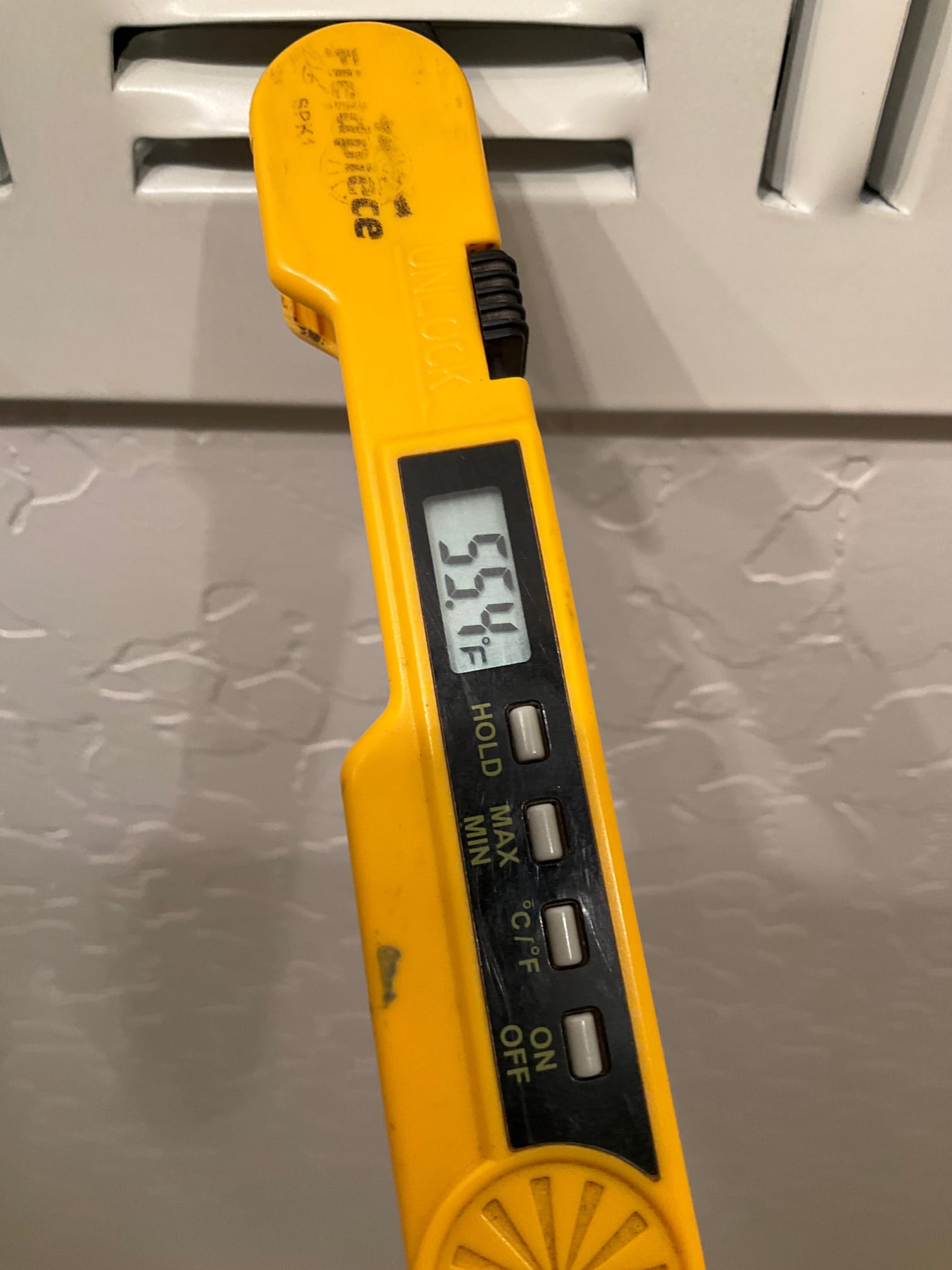 Diagnostic instrument display shows 55.4 °F.