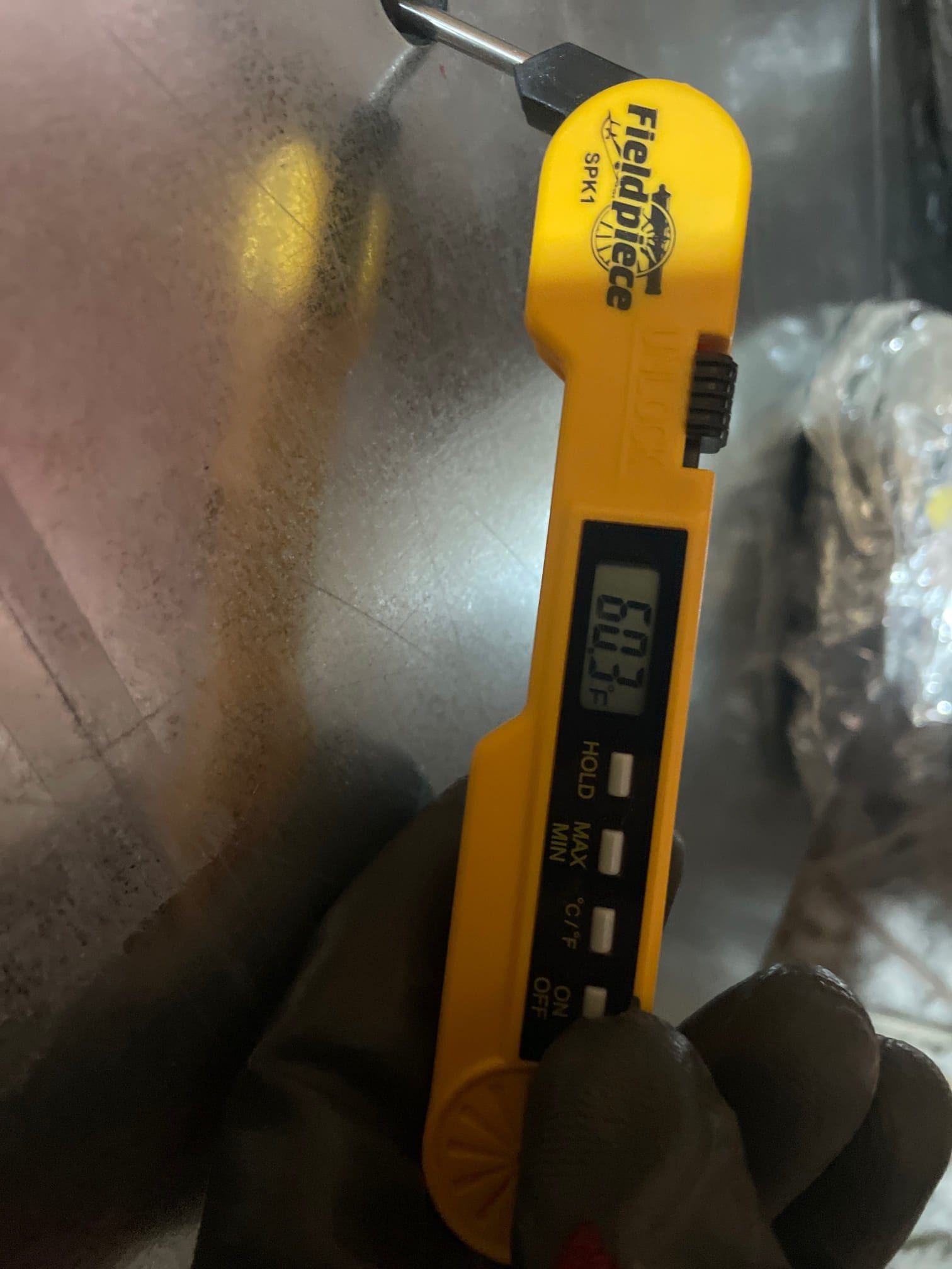 Diagnostic instrument display shows 60.3 °F.