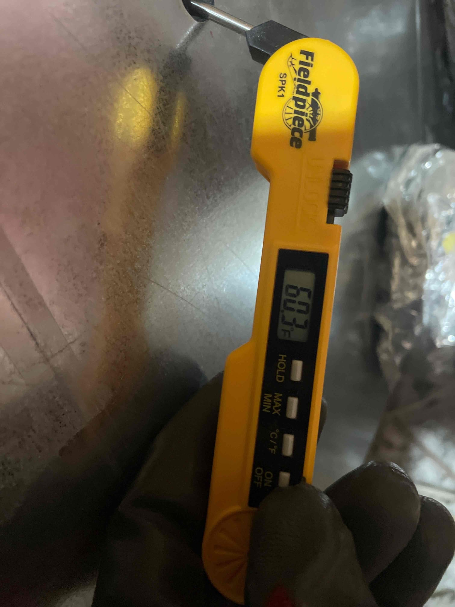 Diagnostic instrument display shows 60.3 °F.