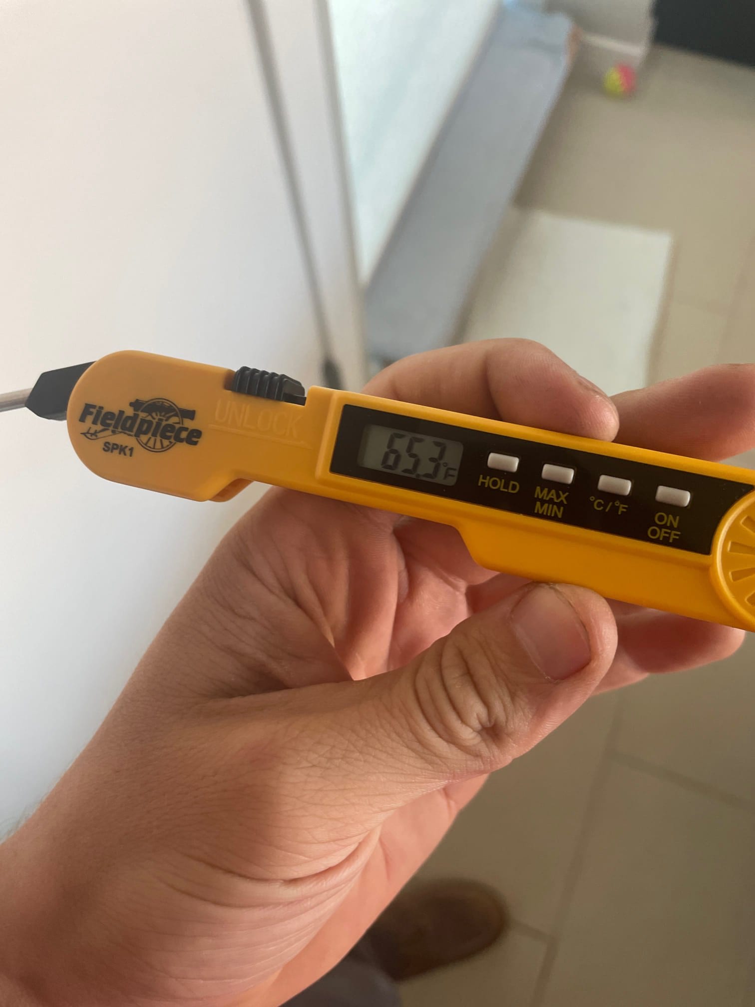 Diagnostic instrument display shows 65.3 °F.