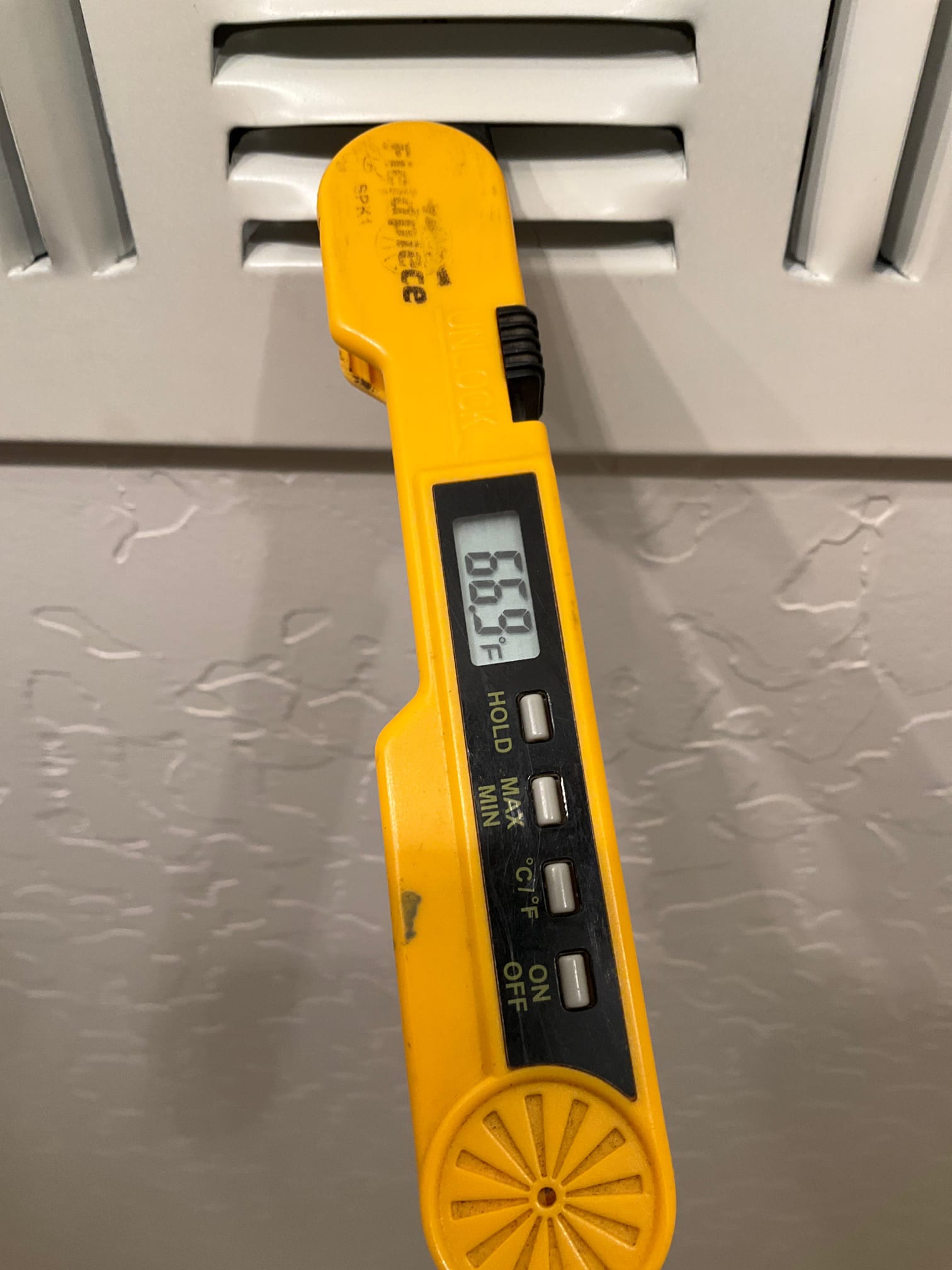 Diagnostic instrument display shows 66.9 °F.